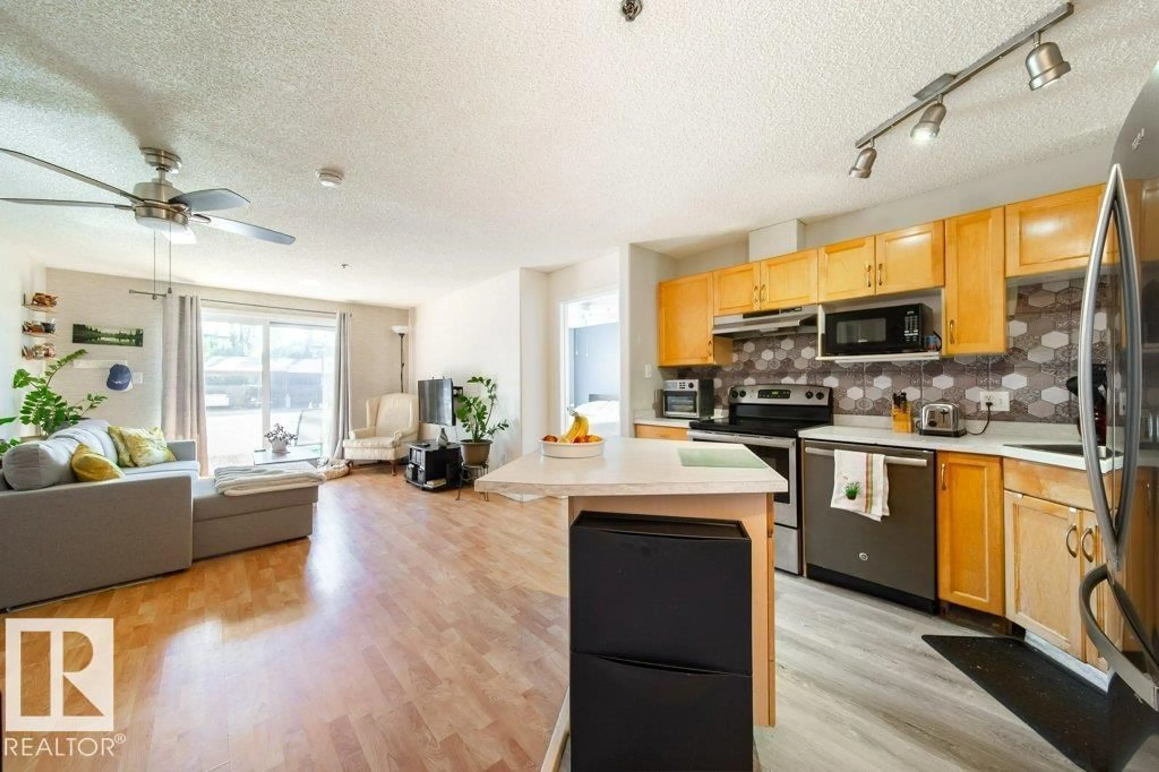 Open concept kitchen, unknown for #118 - 2305 35A AV, Edmonton Alberta T6T1Z2