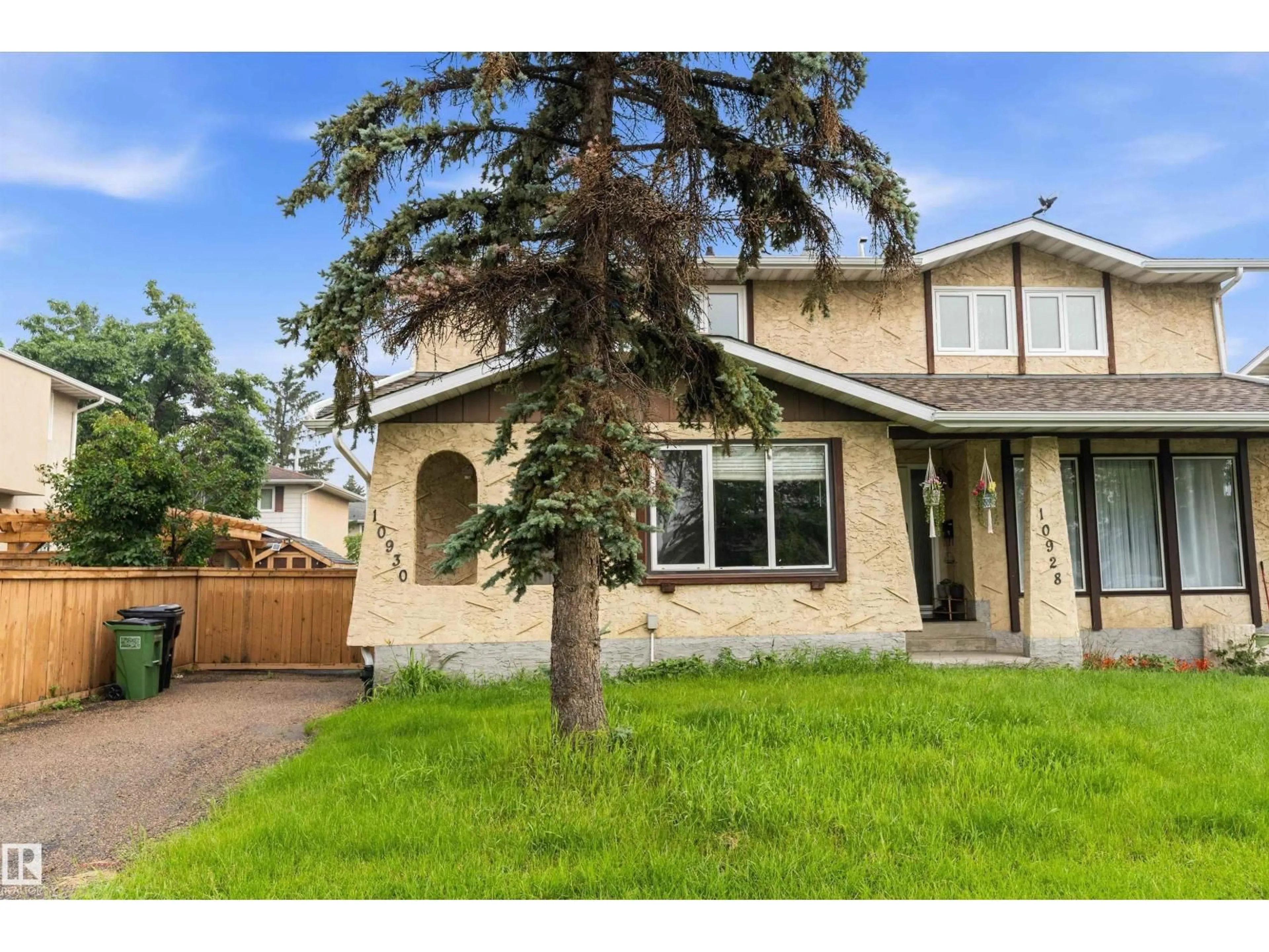 Home with vinyl exterior material, street for 10930 BEAUMARIS RD, Edmonton Alberta T5X1Z6