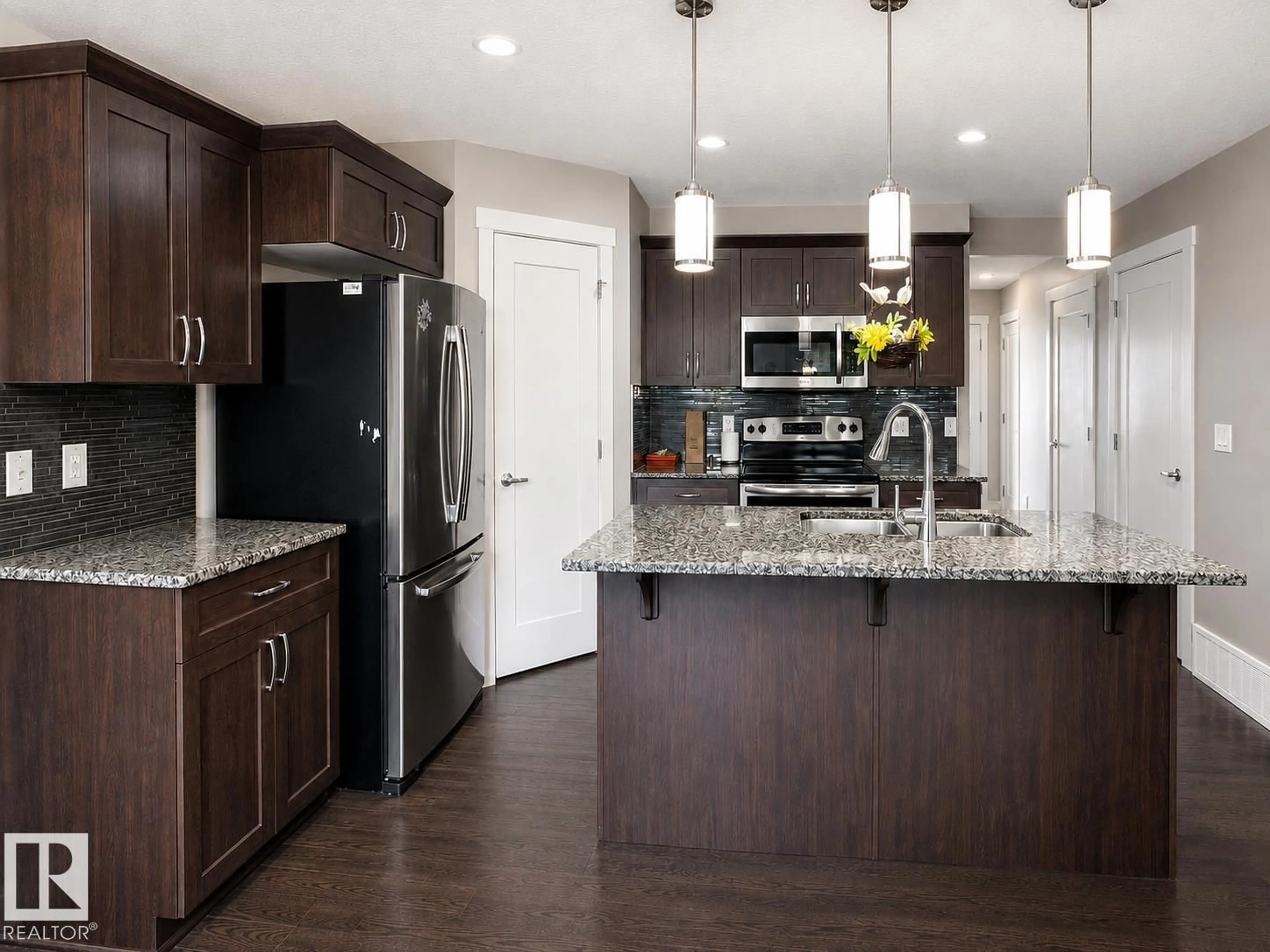 Open concept kitchen, unknown for 20312 42 AV, Edmonton Alberta T6M0R8