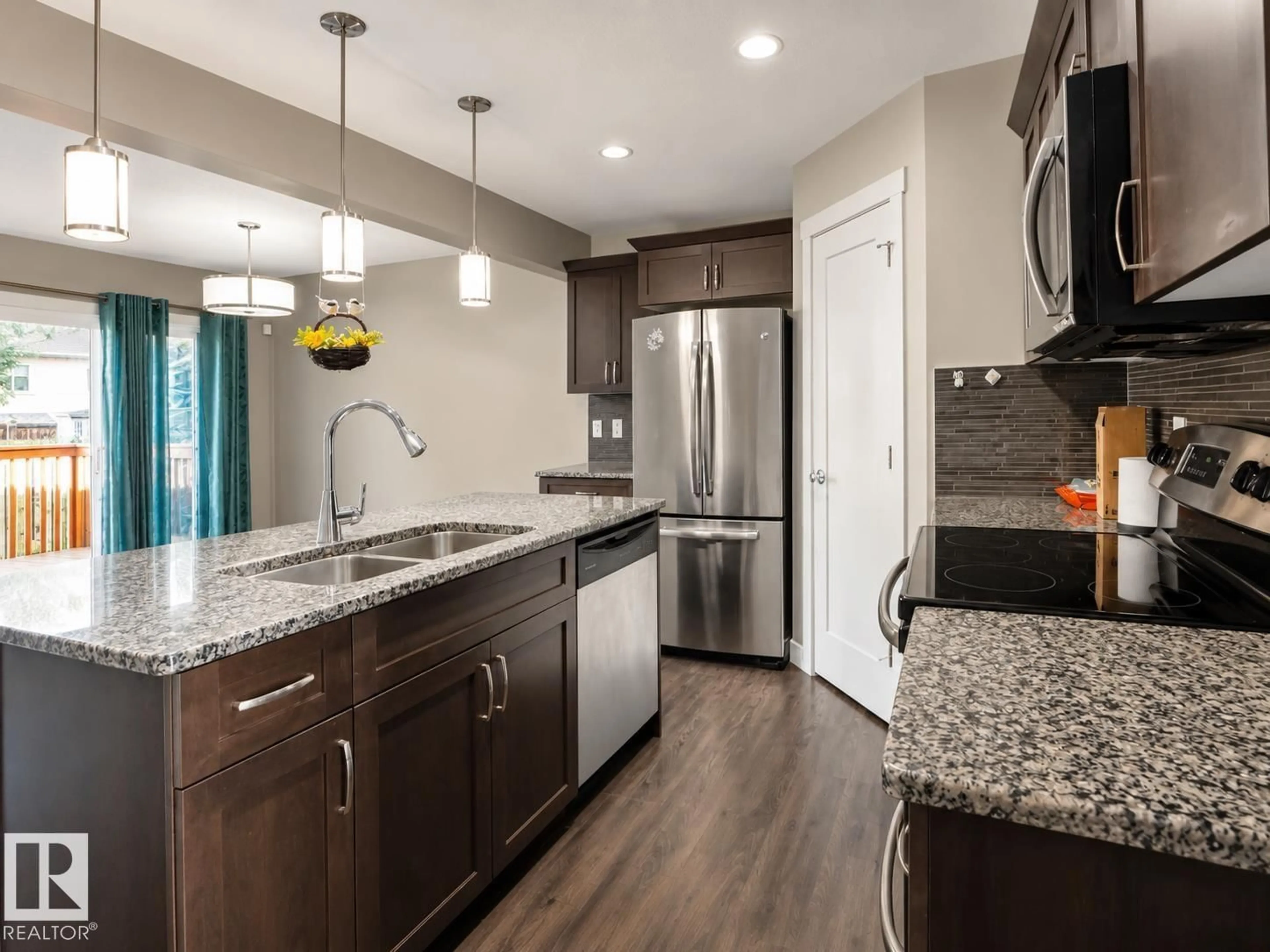 Open concept kitchen, unknown for 20312 42 AV, Edmonton Alberta T6M0R8