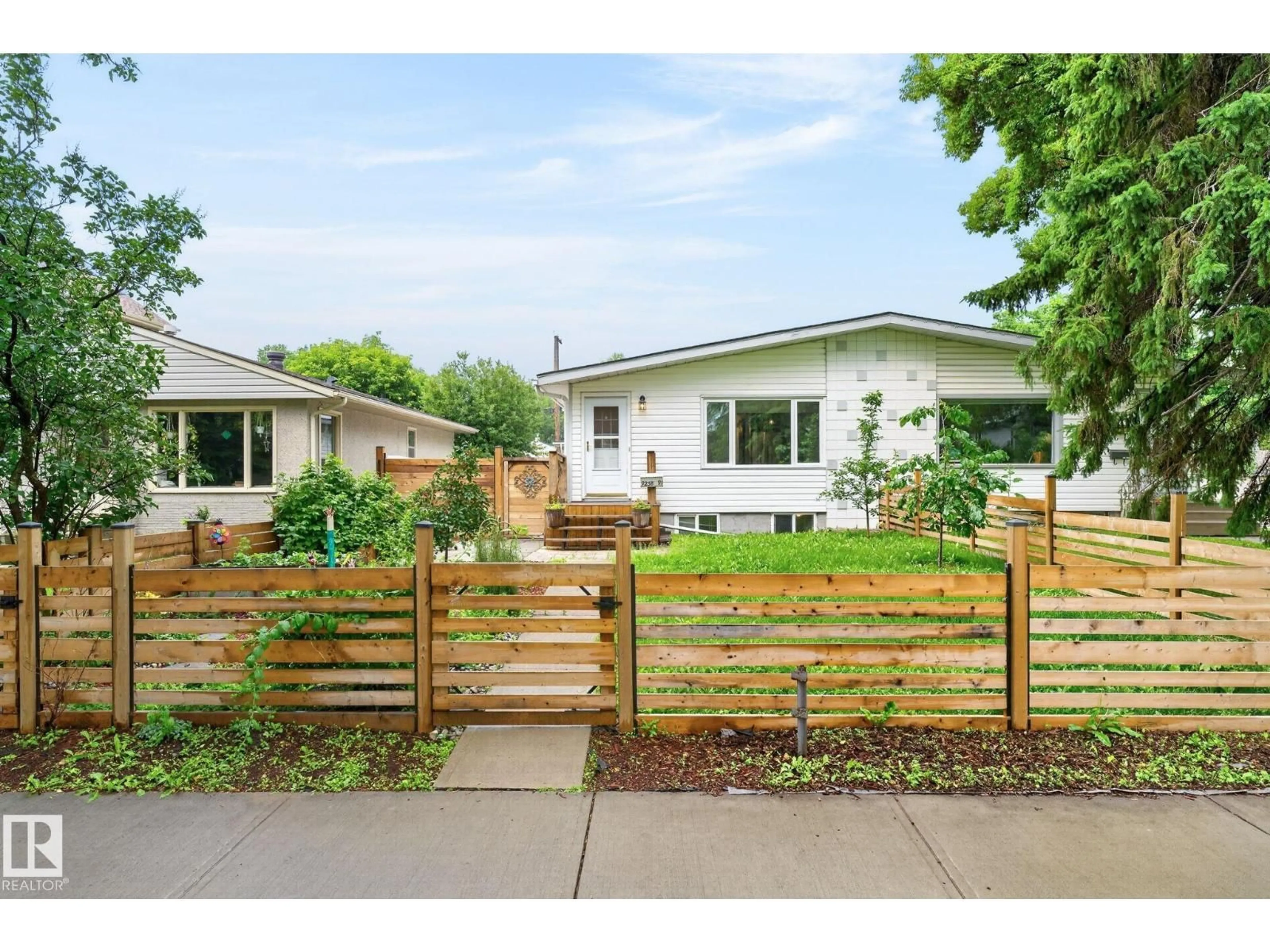 Home with brick exterior material, street for NW - 9258 91 ST, Edmonton Alberta T6C3N8