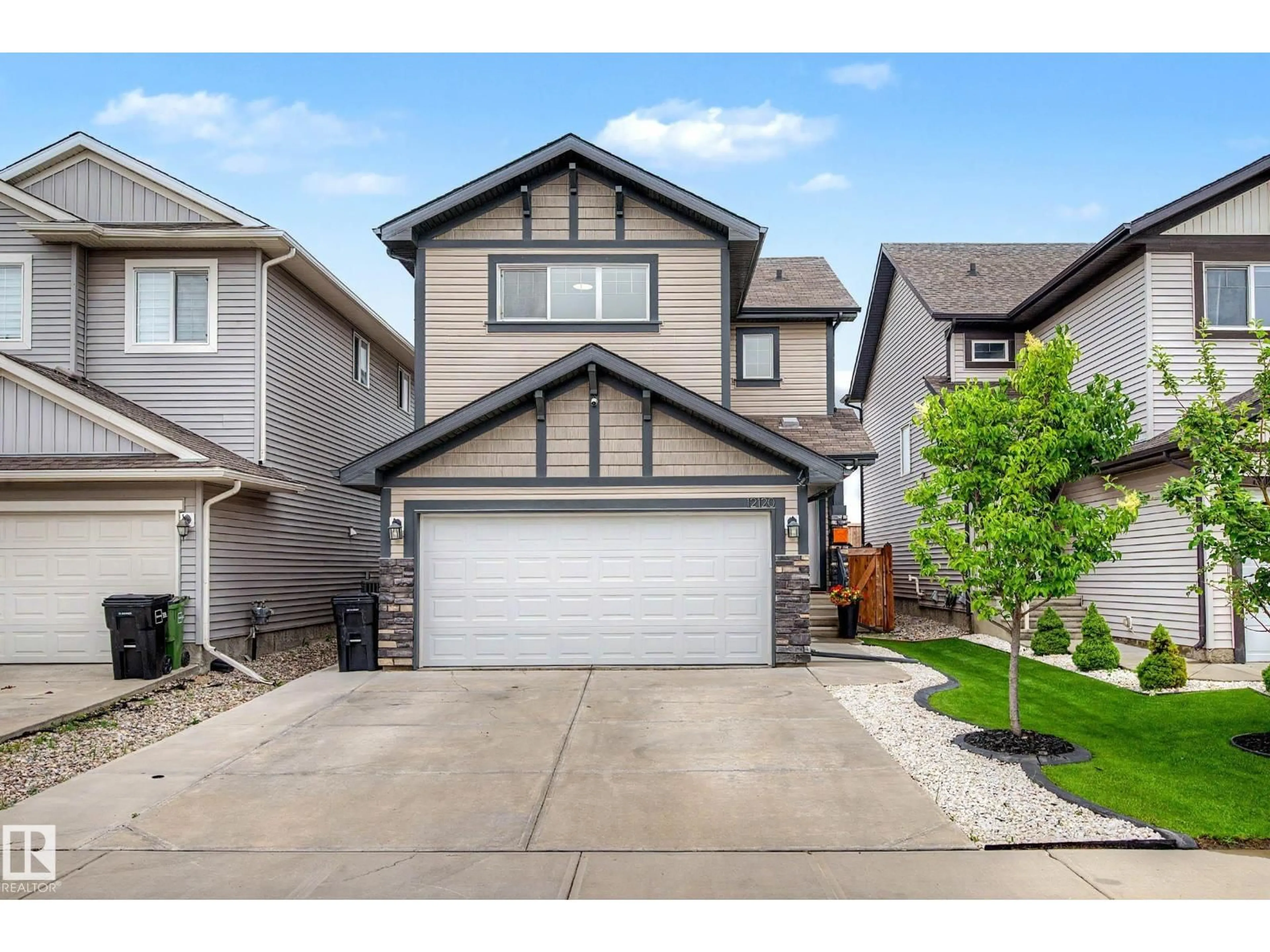 Home with vinyl exterior material, street for NW - 12120 177 AV, Edmonton Alberta T5X0L1