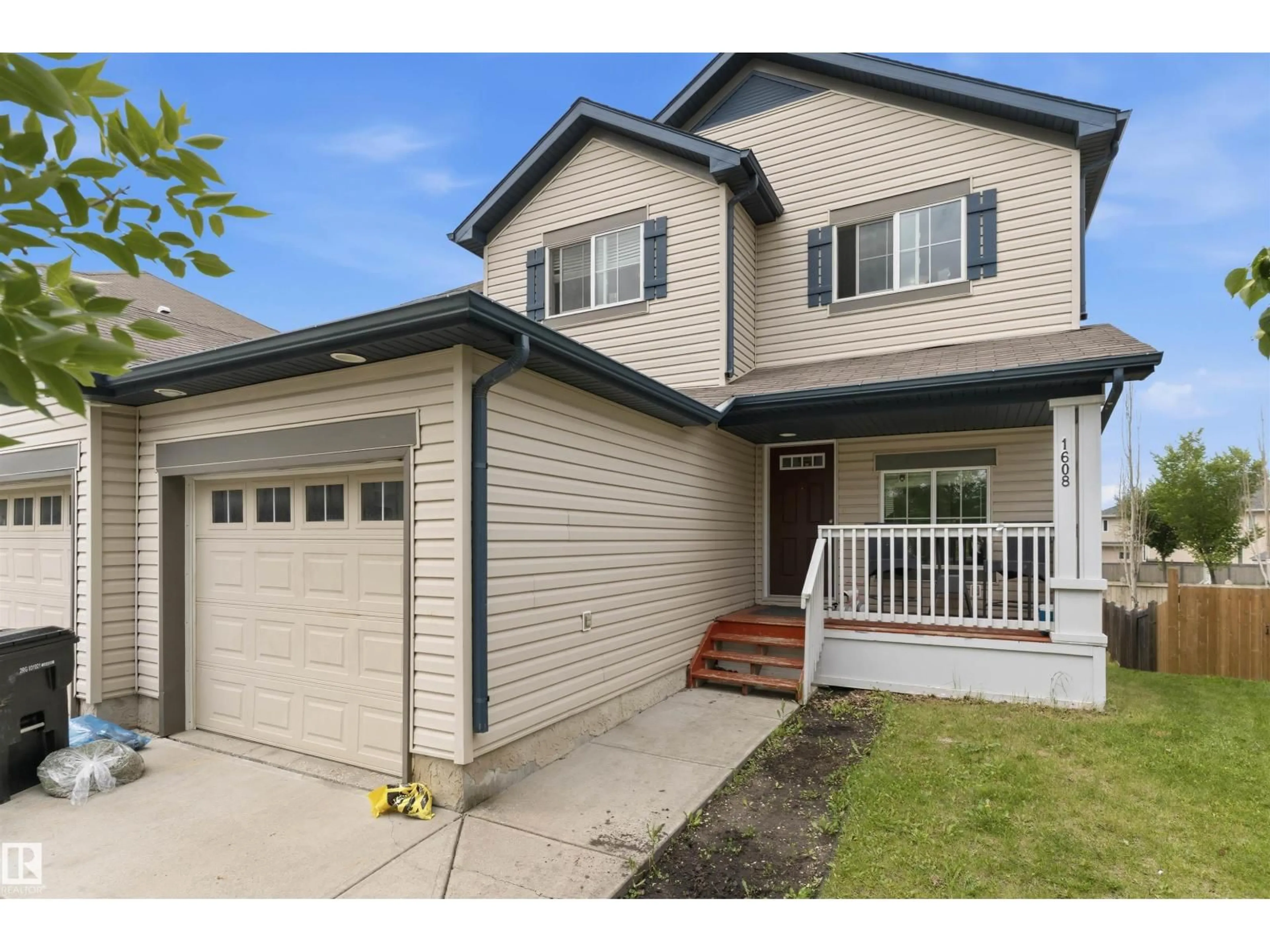 Home with vinyl exterior material, street for SW - 1608 65 ST, Edmonton Alberta T6X0N1