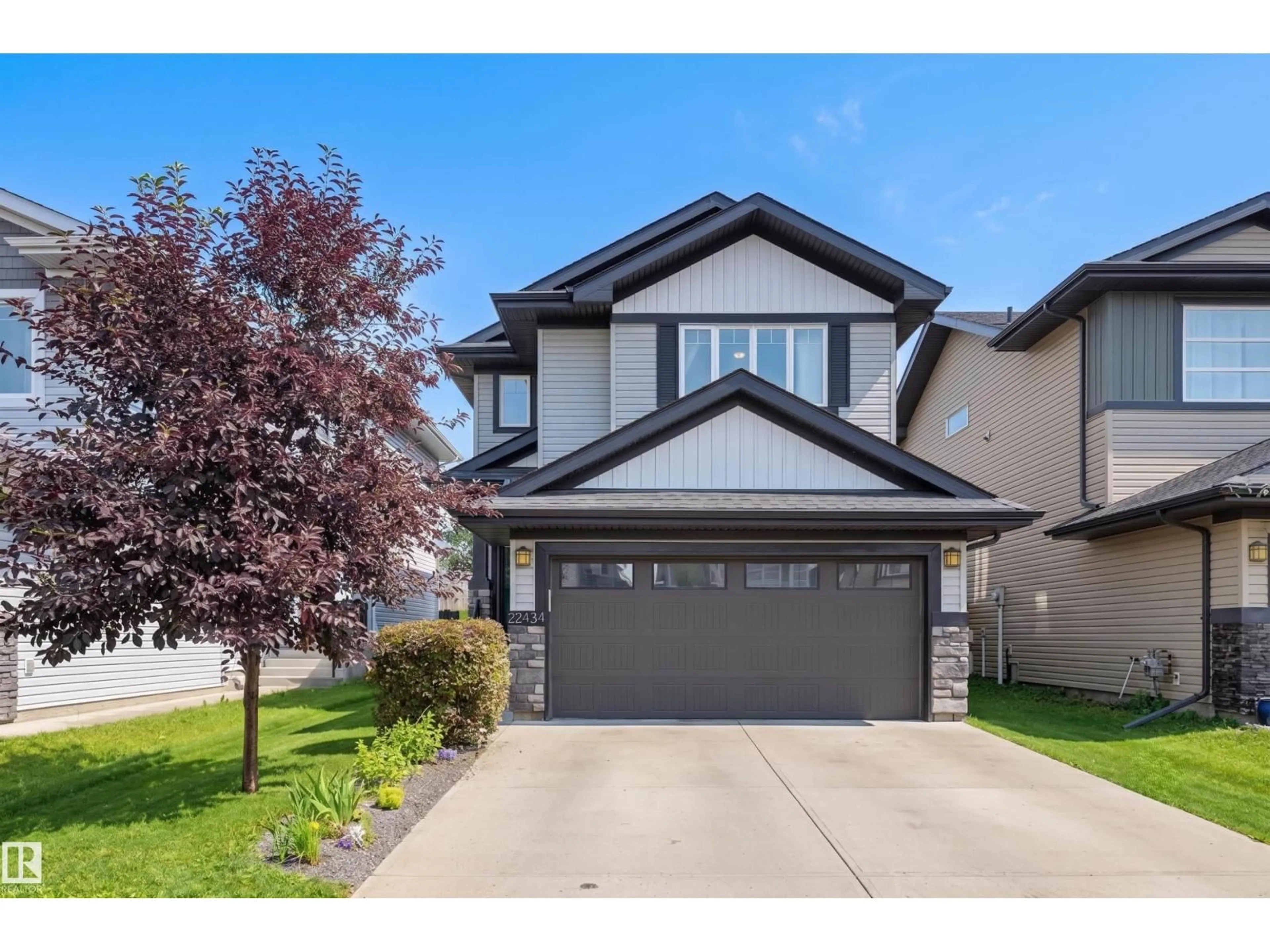 Home with vinyl exterior material, street for 22434 99A AV, Edmonton Alberta T5T7C3