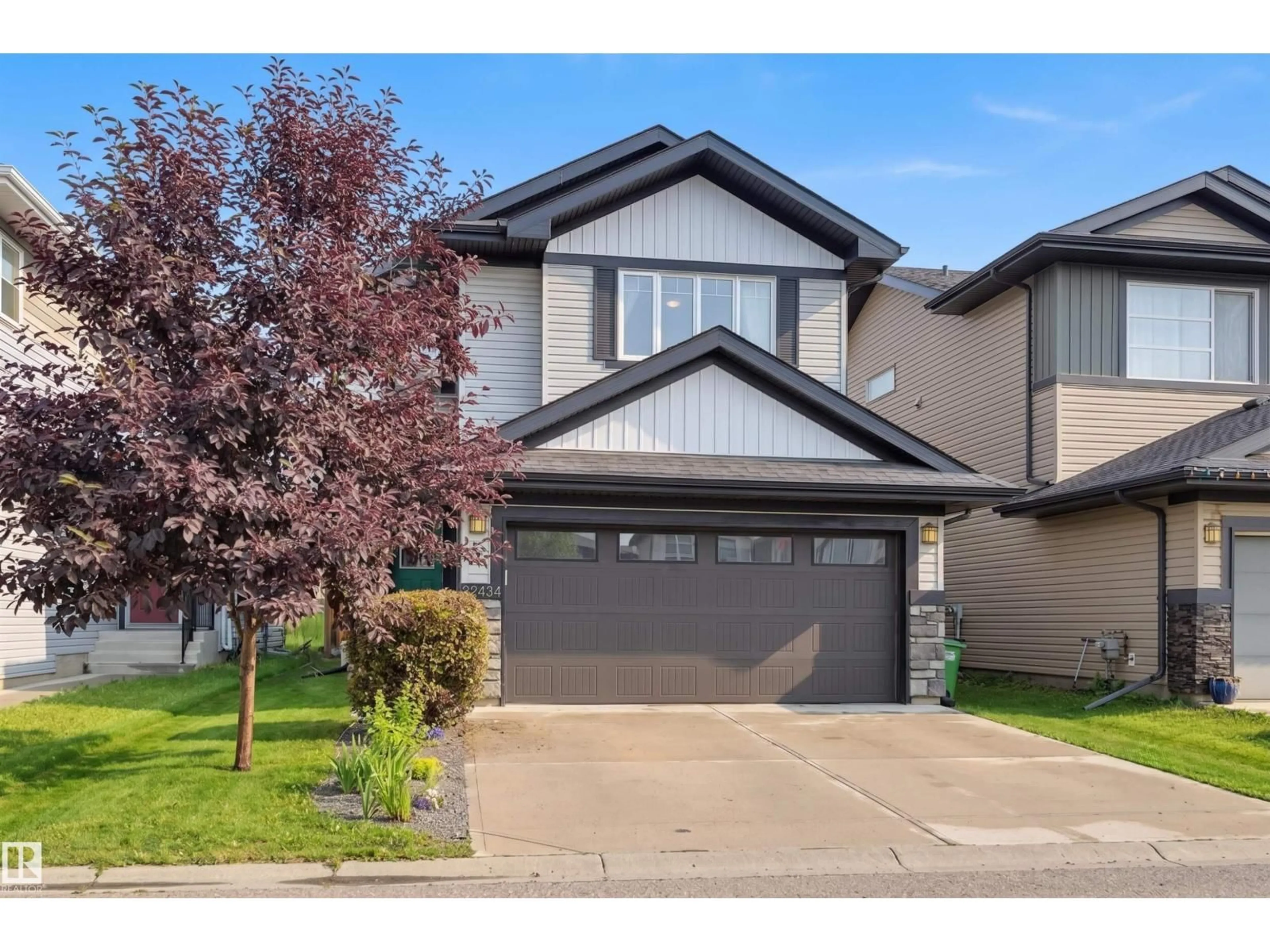 Home with vinyl exterior material, street for 22434 99A AV, Edmonton Alberta T5T7C3