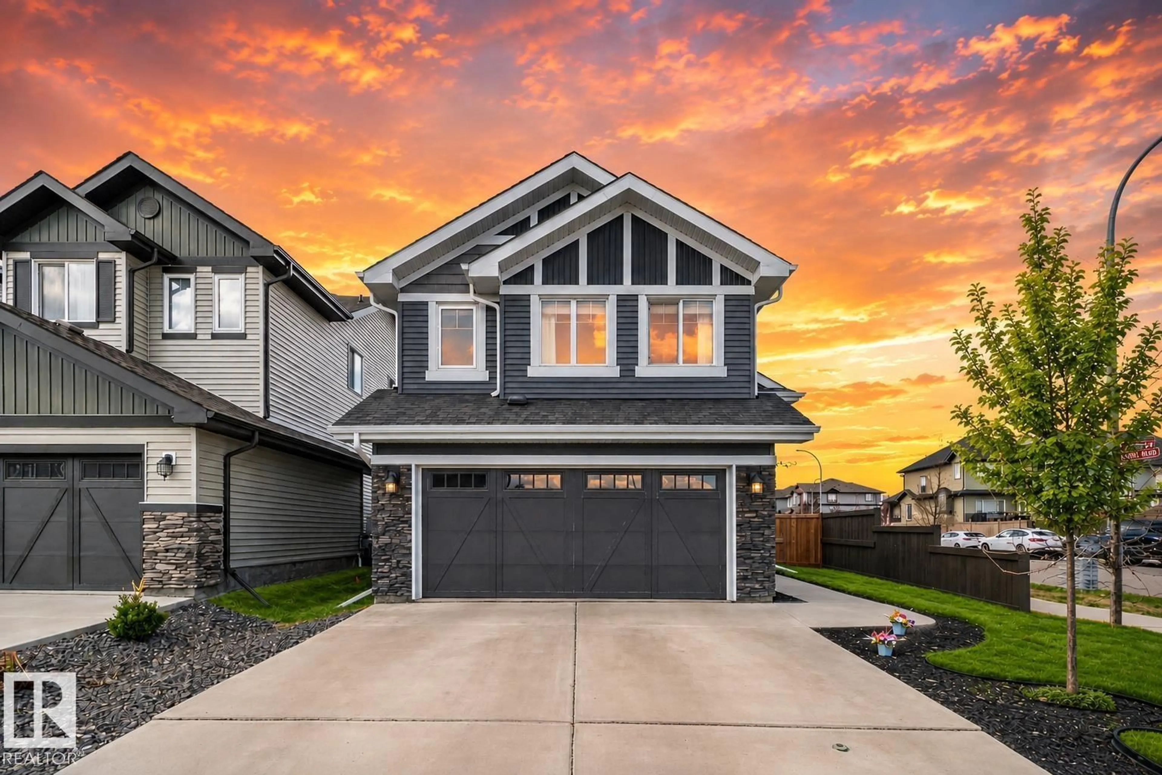 Home with vinyl exterior material, street for NW - 9724 223 ST, Edmonton Alberta T5T7B7