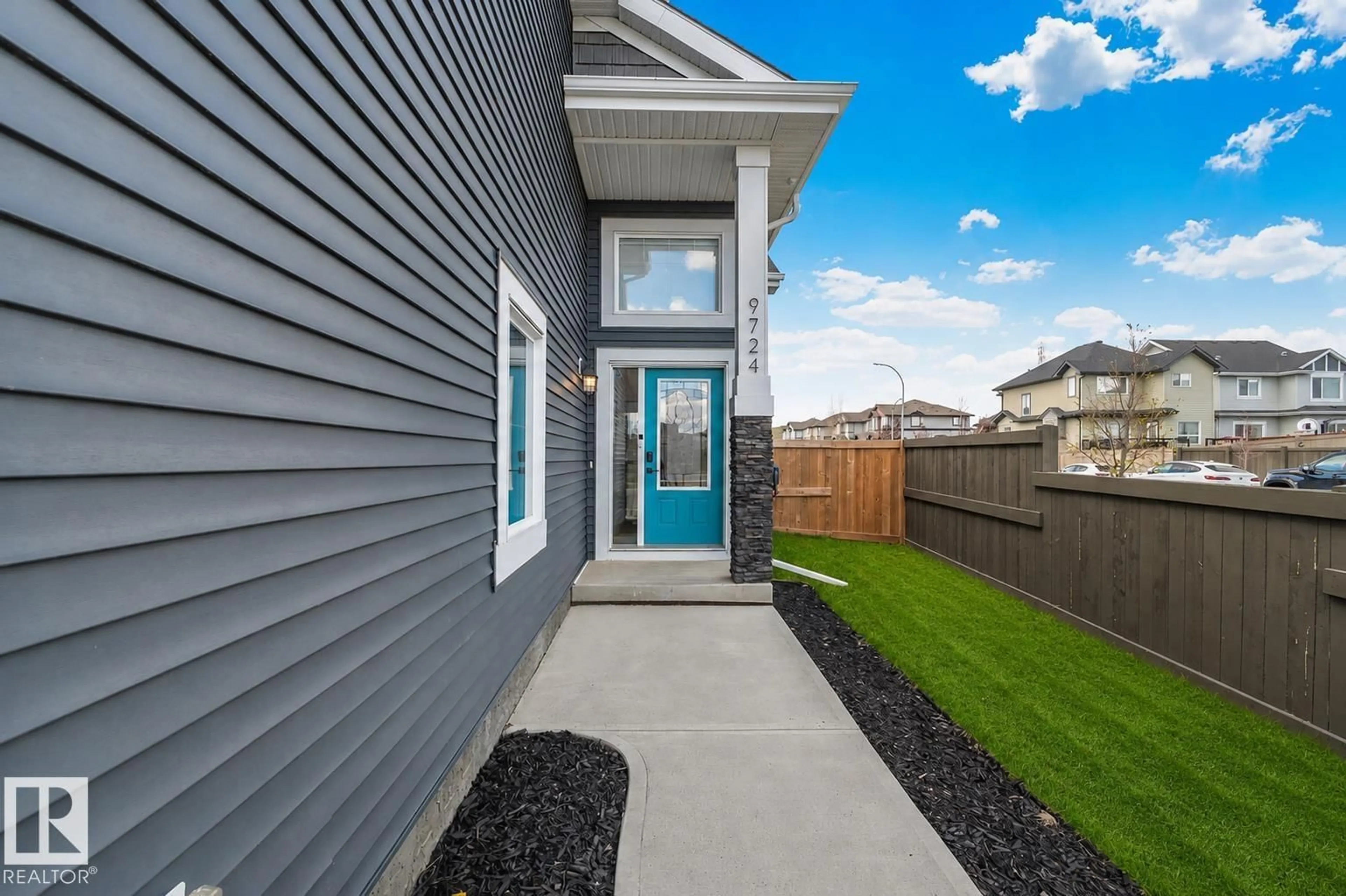 Home with vinyl exterior material, street for NW - 9724 223 ST, Edmonton Alberta T5T7B7