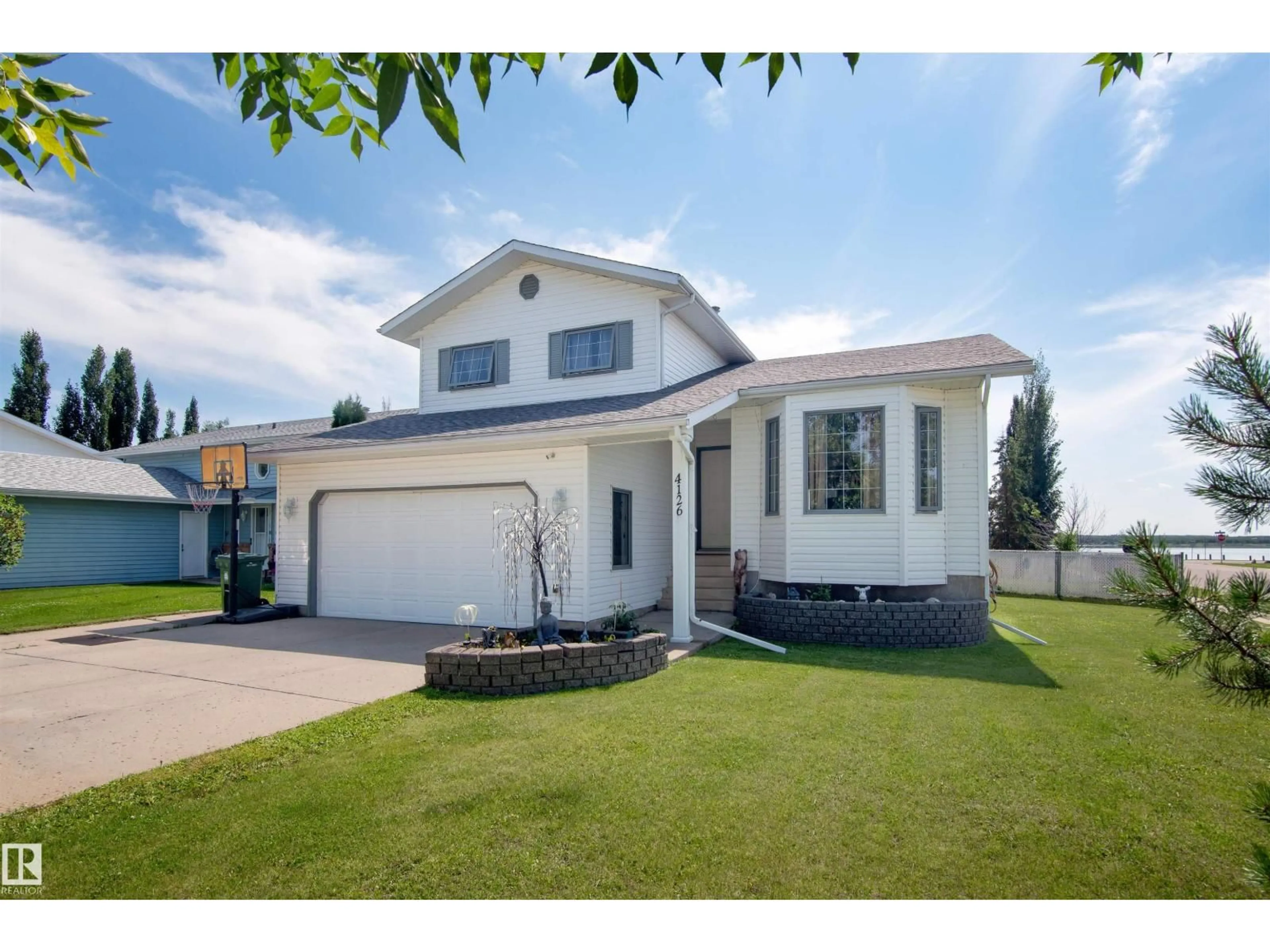 Home with vinyl exterior material, street for 4126 40 AV, Bonnyville Town Alberta T9N1S4