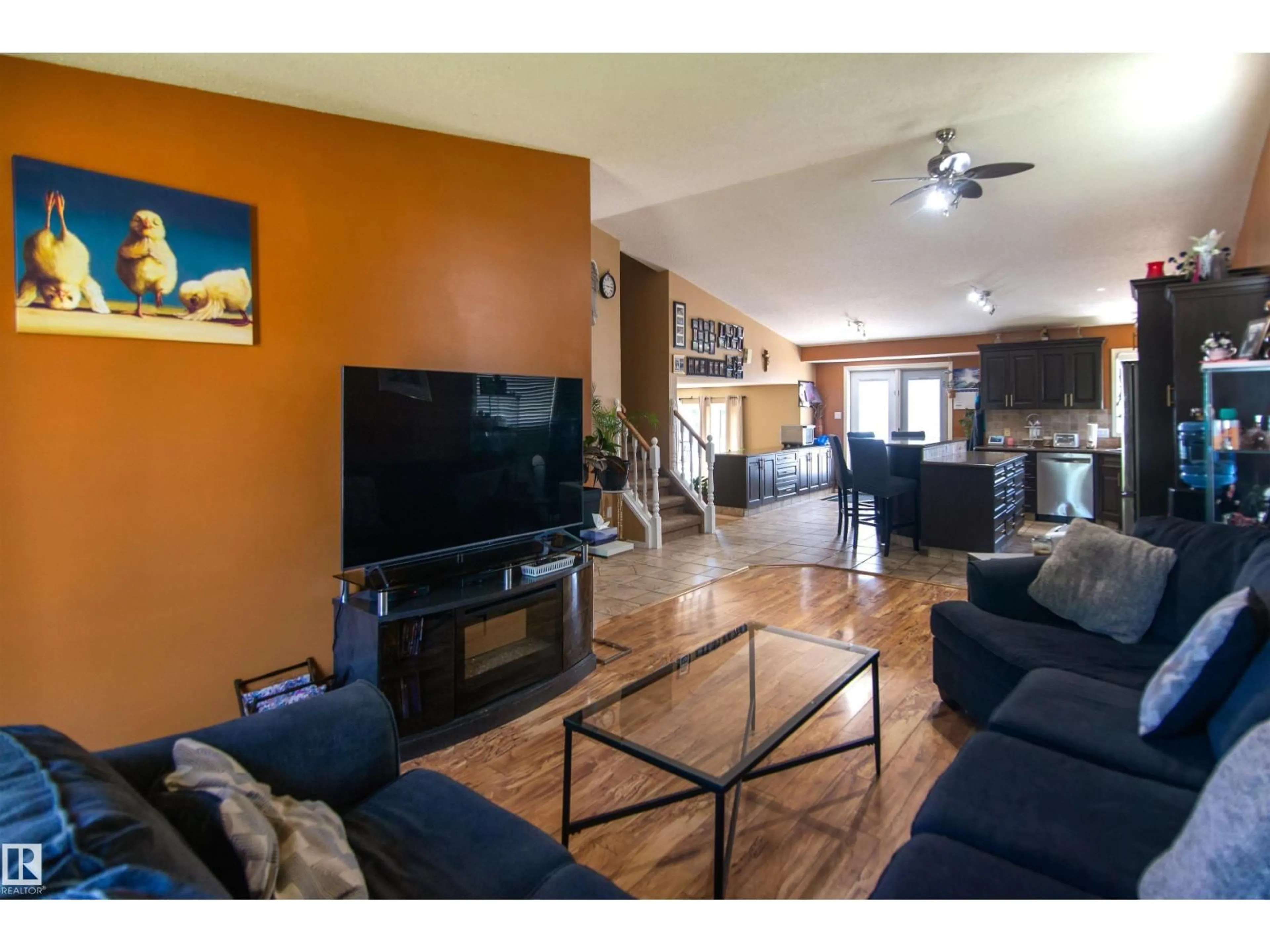 Living room with furniture, wood/laminate floor for 4126 40 AV, Bonnyville Town Alberta T9N1S4