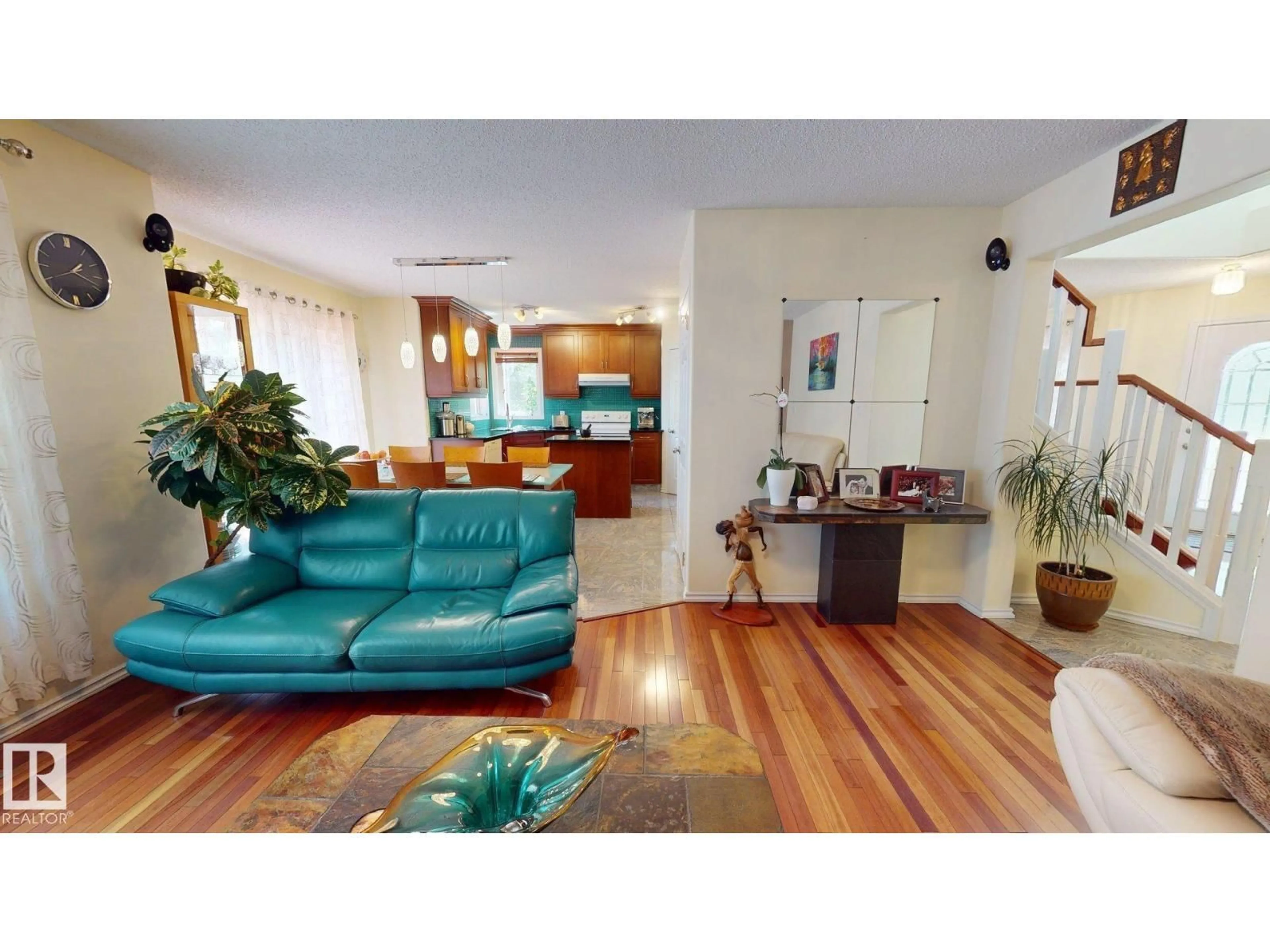 Living room with furniture, wood/laminate floor for 4 OAKLAND WY, St. Albert Alberta T8N6M4