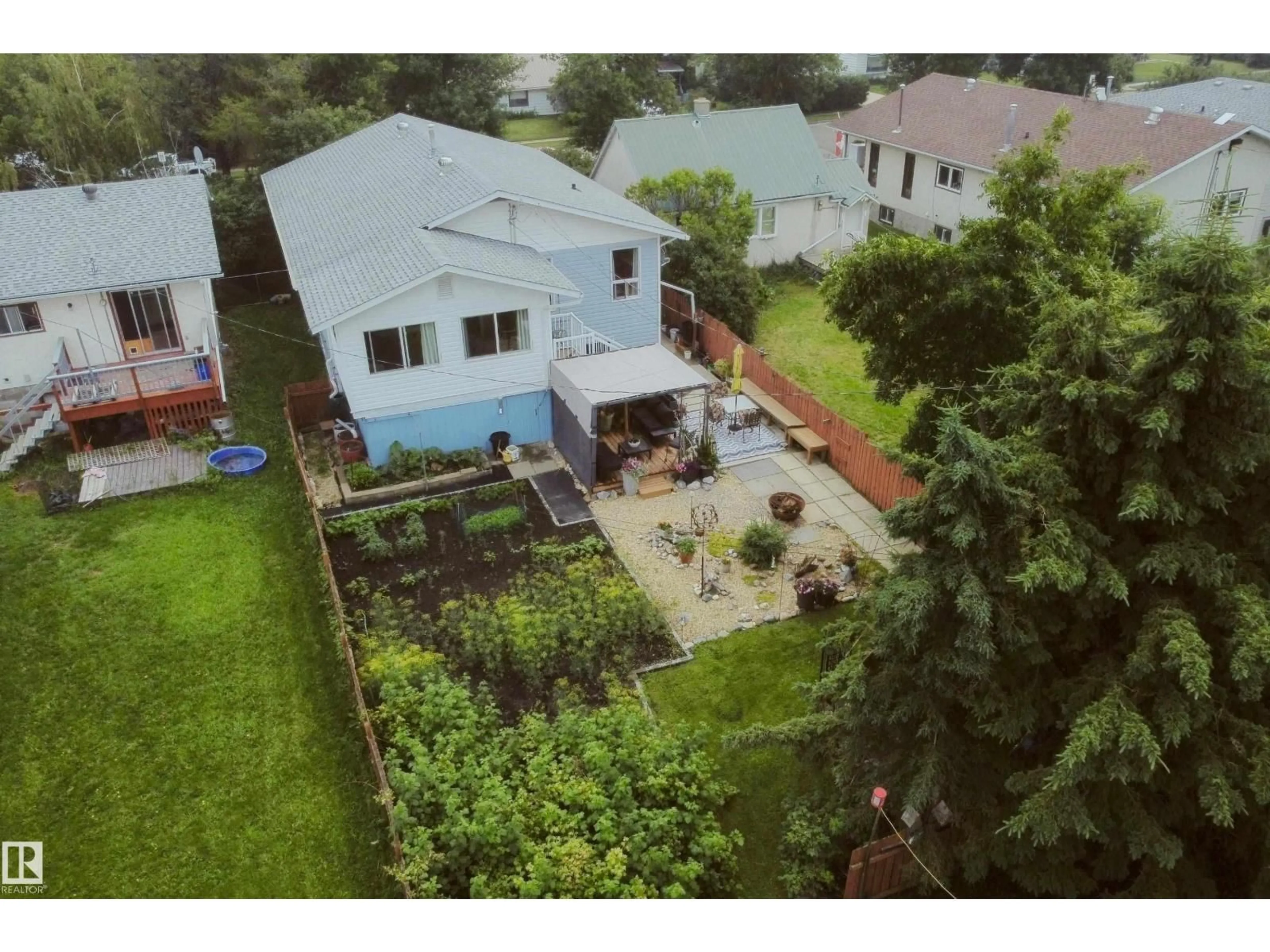 A pic from outside/outdoor area/front of a property/back of a property/a pic from drone, street for 5020 47 ST, Barrhead Alberta T7N1H5