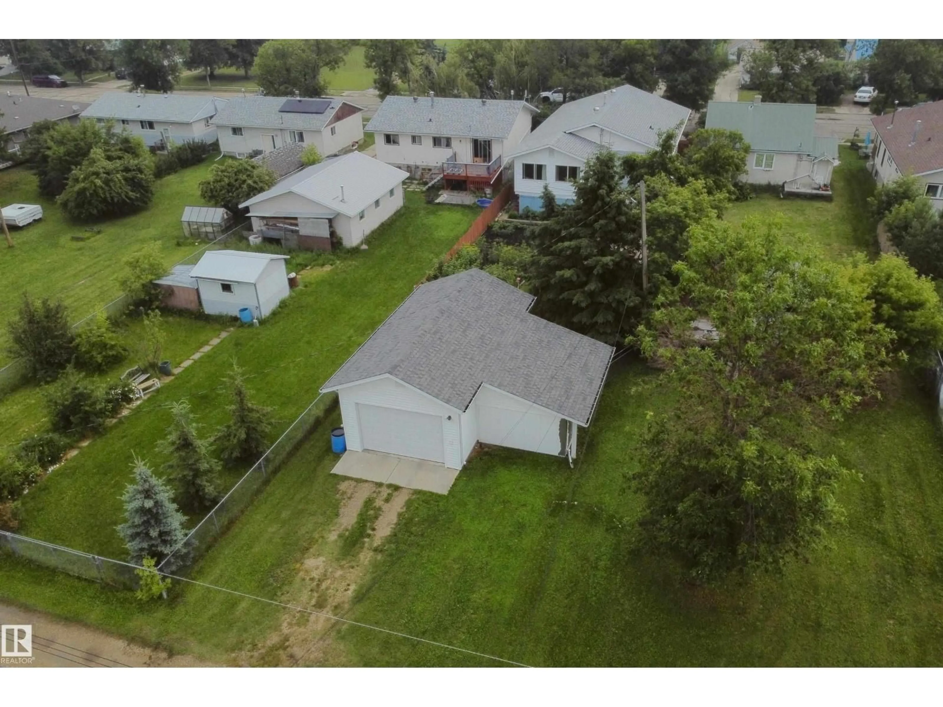 A pic from outside/outdoor area/front of a property/back of a property/a pic from drone, street for 5020 47 ST, Barrhead Alberta T7N1H5
