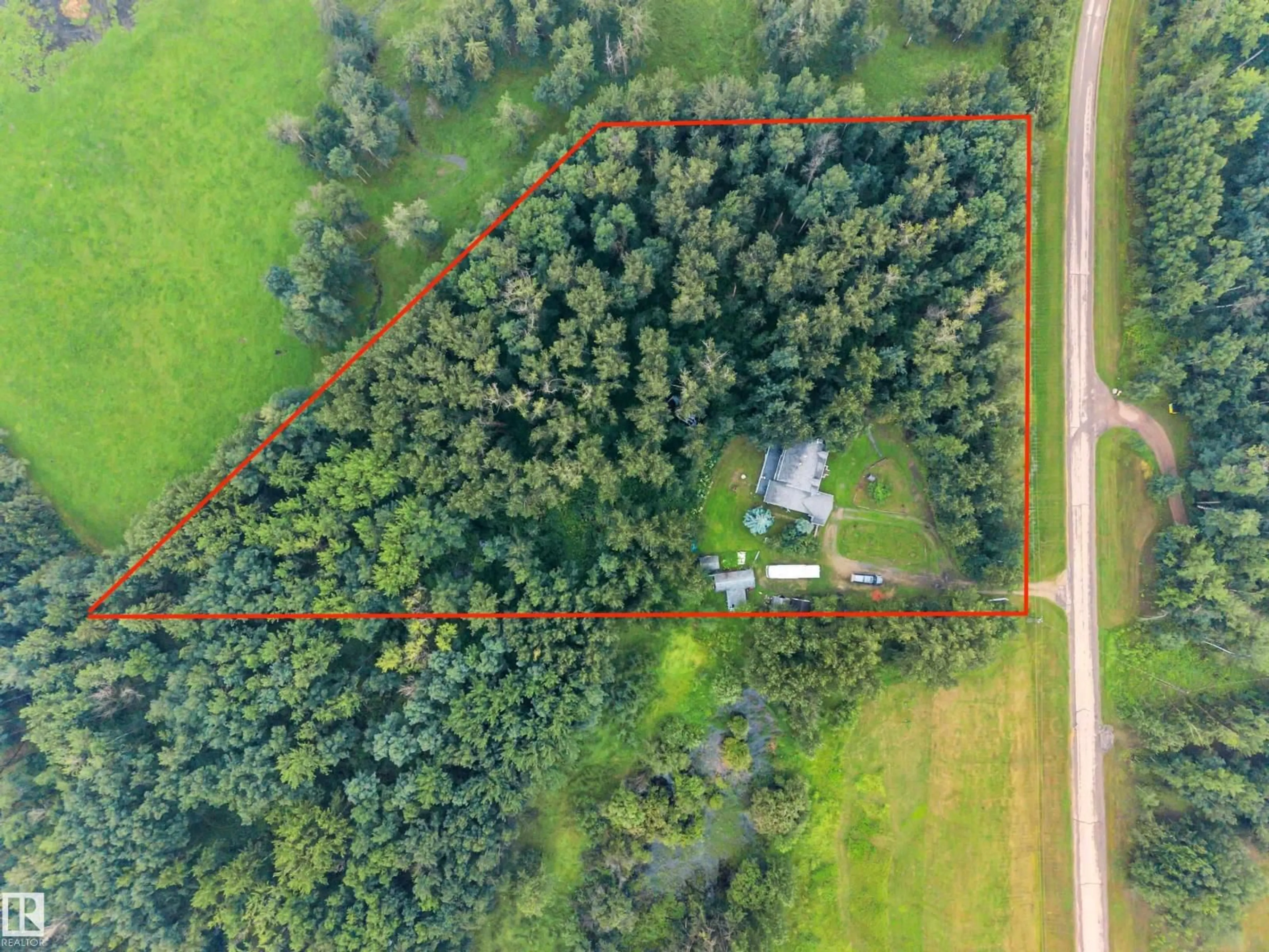 A pic from outside/outdoor area/front of a property/back of a property/a pic from drone, forest/trees view for 38 54120 RGE ROAD 12, Rural Parkland County Alberta T7Y0A5