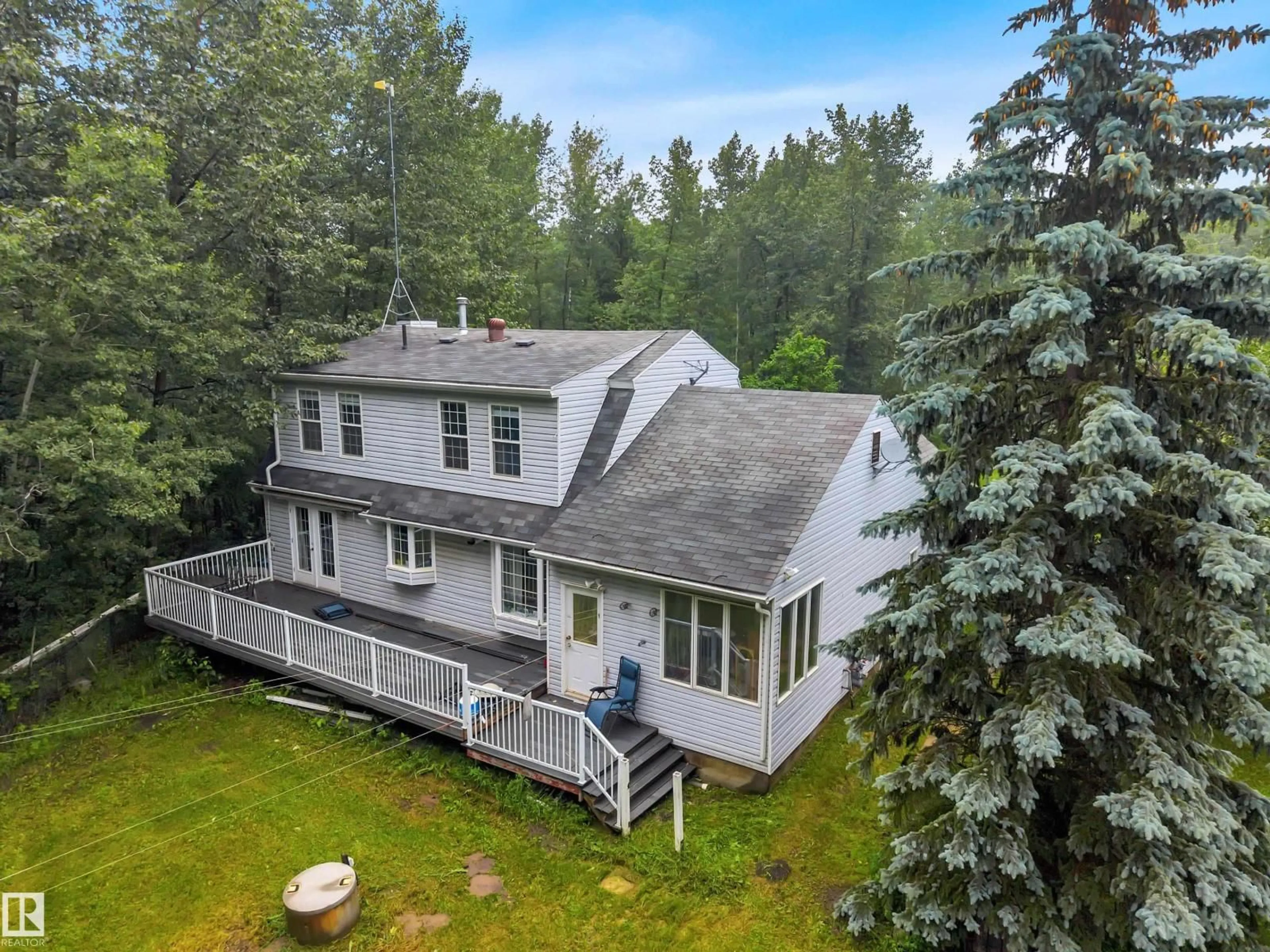 A pic from outside/outdoor area/front of a property/back of a property/a pic from drone, unknown for 38 54120 RGE ROAD 12, Rural Parkland County Alberta T7Y0A5