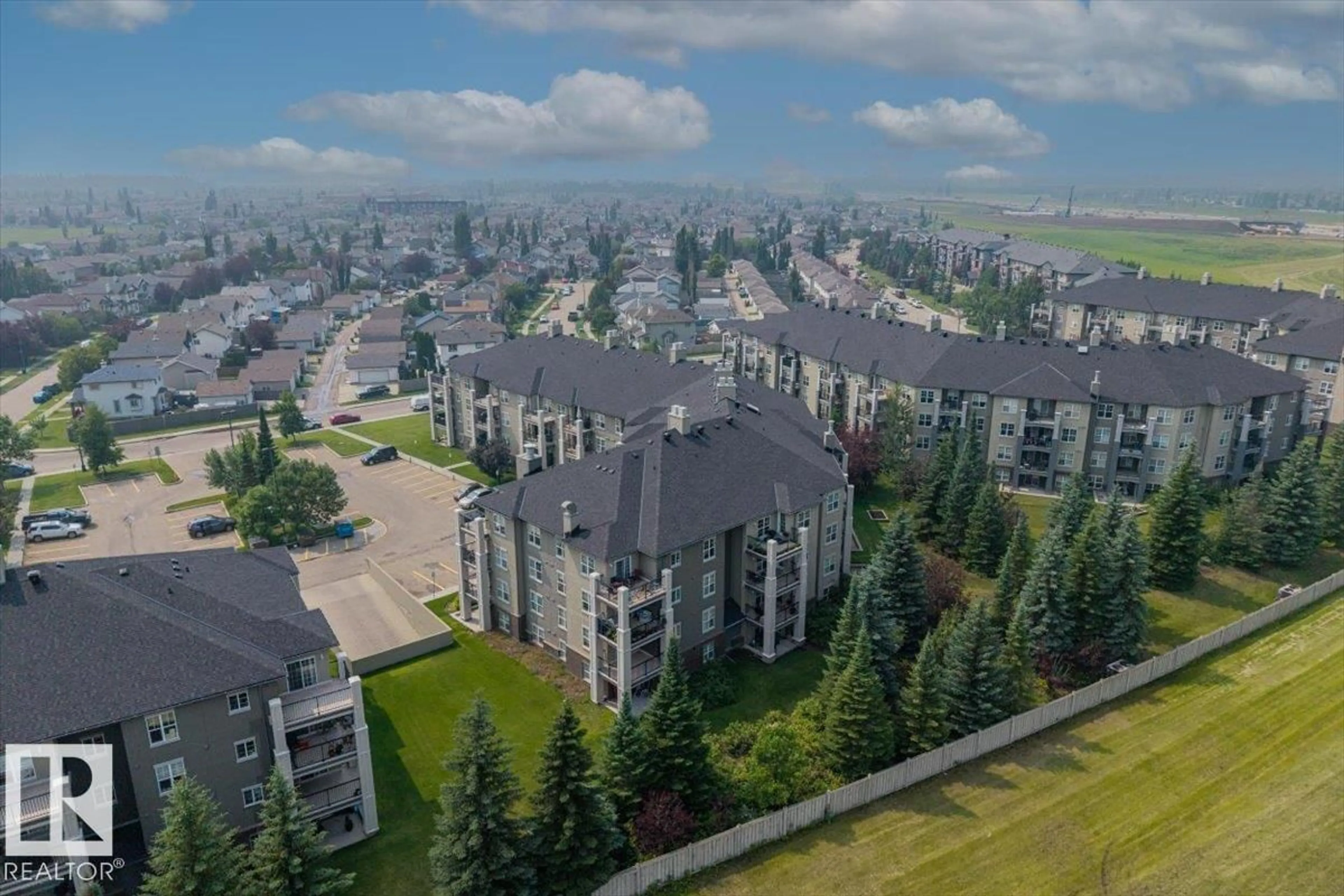 A pic from outside/outdoor area/front of a property/back of a property/a pic from drone, mountain view for 622 - 207 MCALLISTER LO, Edmonton Alberta T6W1N2