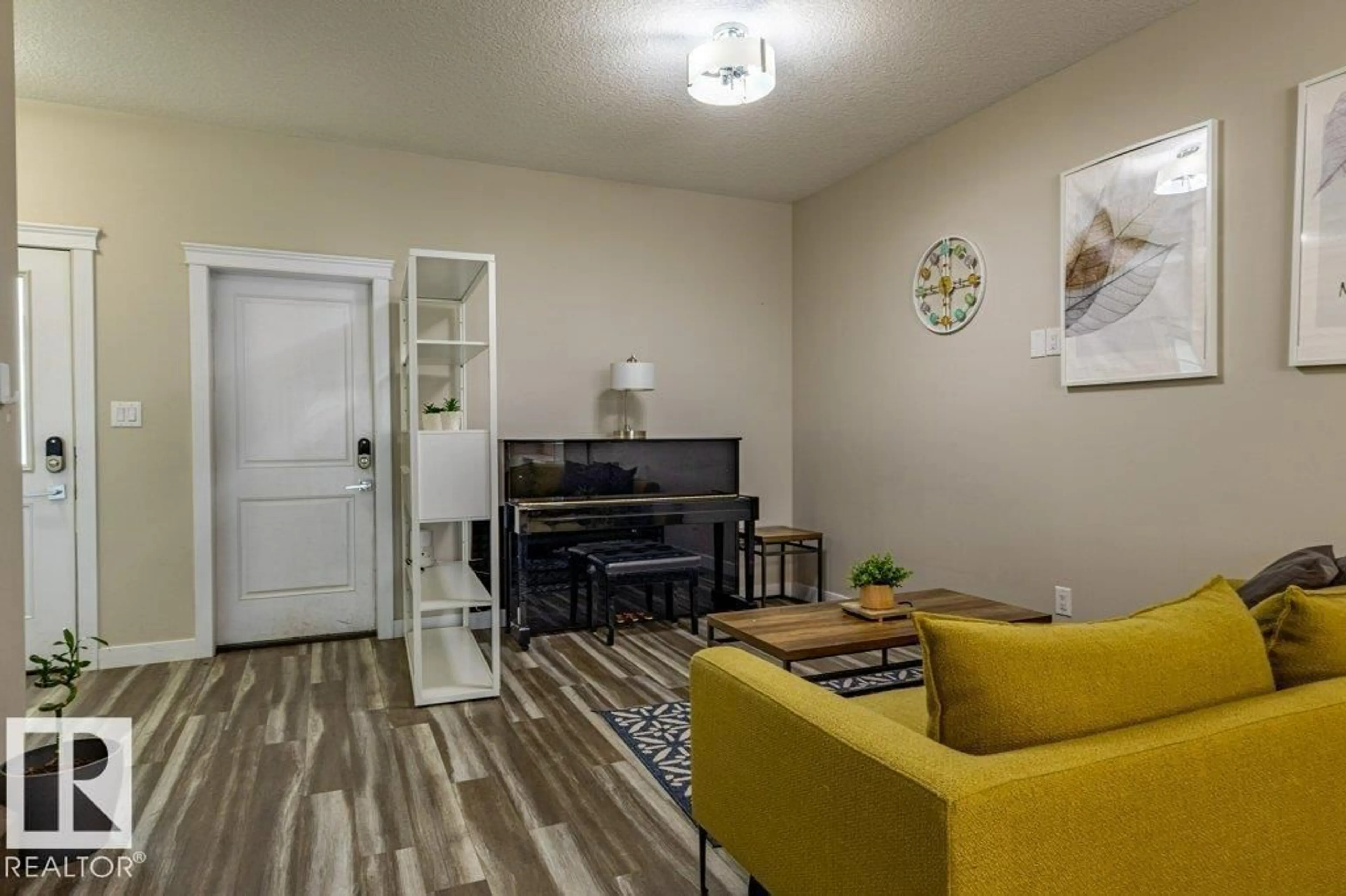 Living room with furniture, unknown for SW SW - 9372 COOPER BN, Edmonton Alberta T6W4A4
