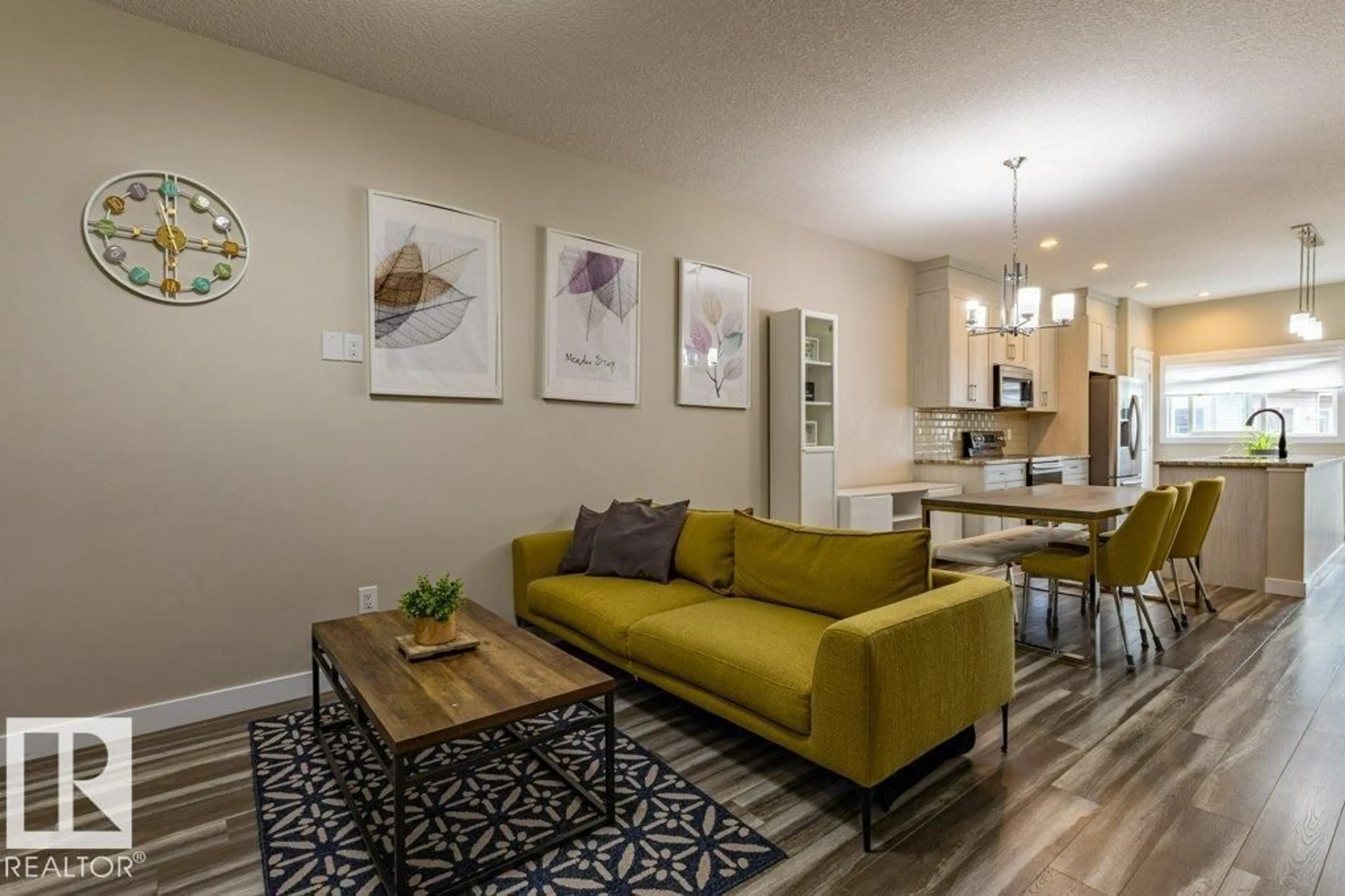 Living room with furniture, wood/laminate floor for SW SW - 9372 COOPER BN, Edmonton Alberta T6W4A4