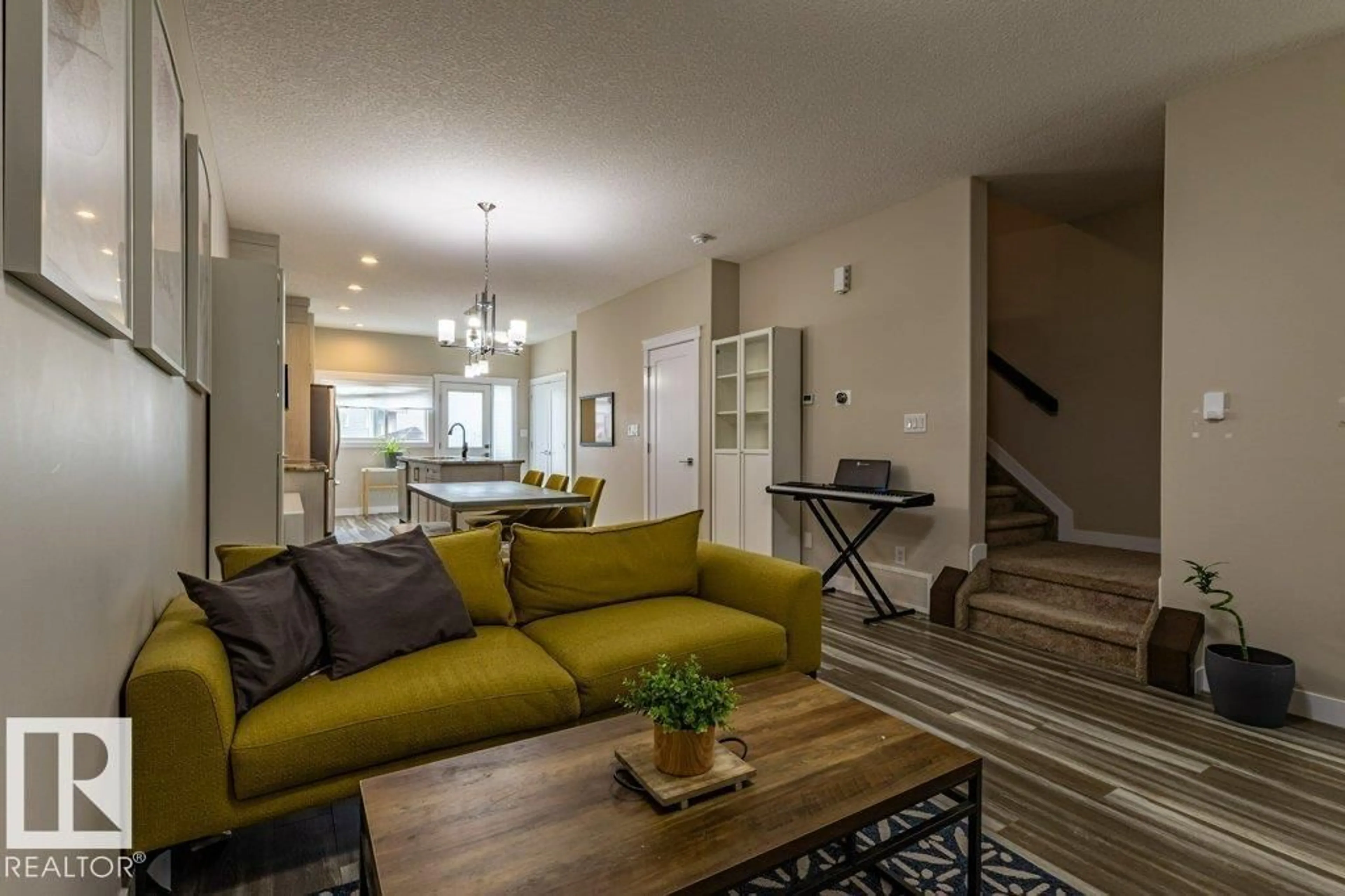 Living room with furniture, unknown for SW SW - 9372 COOPER BN, Edmonton Alberta T6W4A4