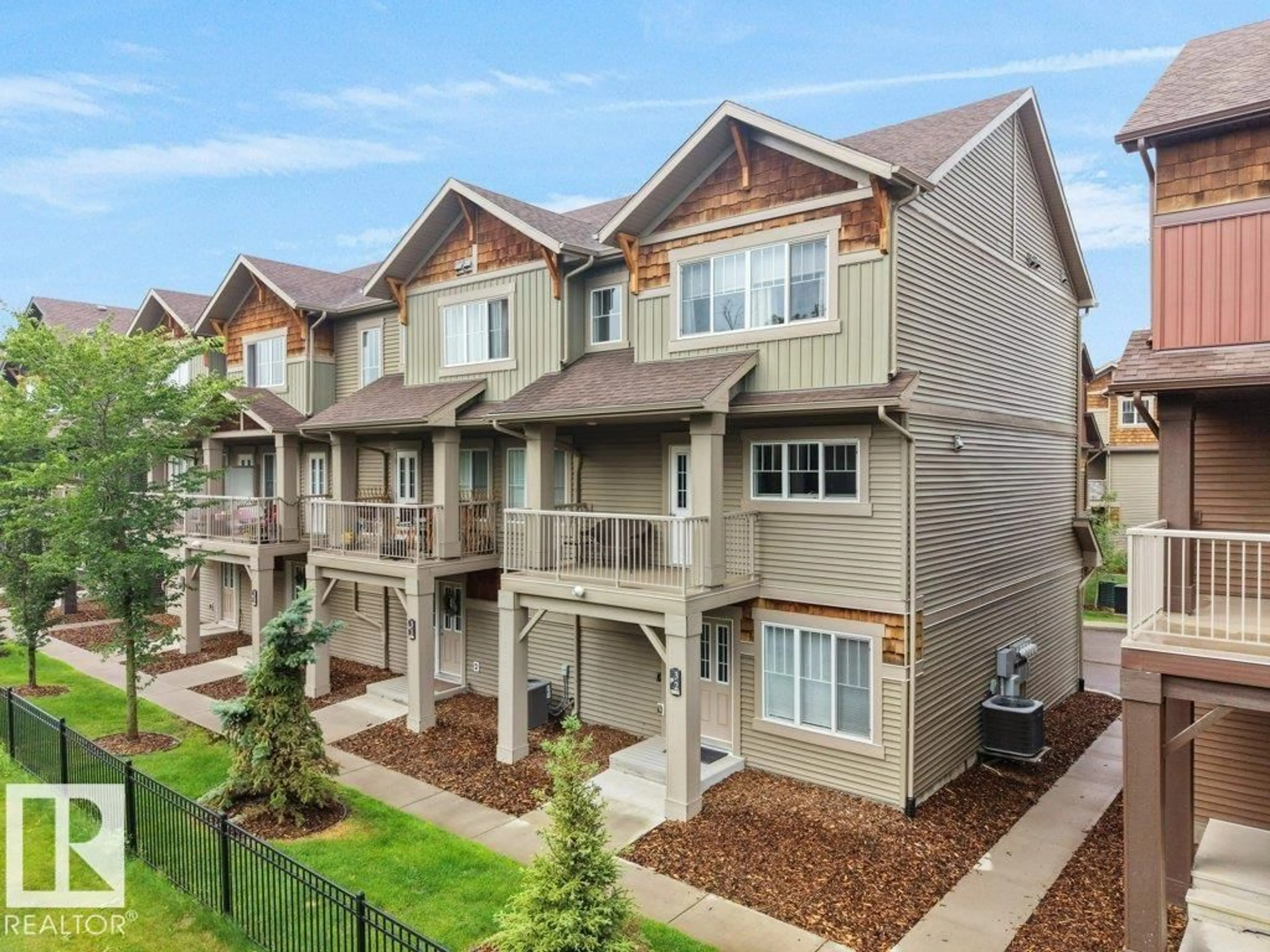 A pic from outside/outdoor area/front of a property/back of a property/a pic from drone, street for #32 - 1005 GRAYDON HILL BV, Edmonton Alberta T6W3J5