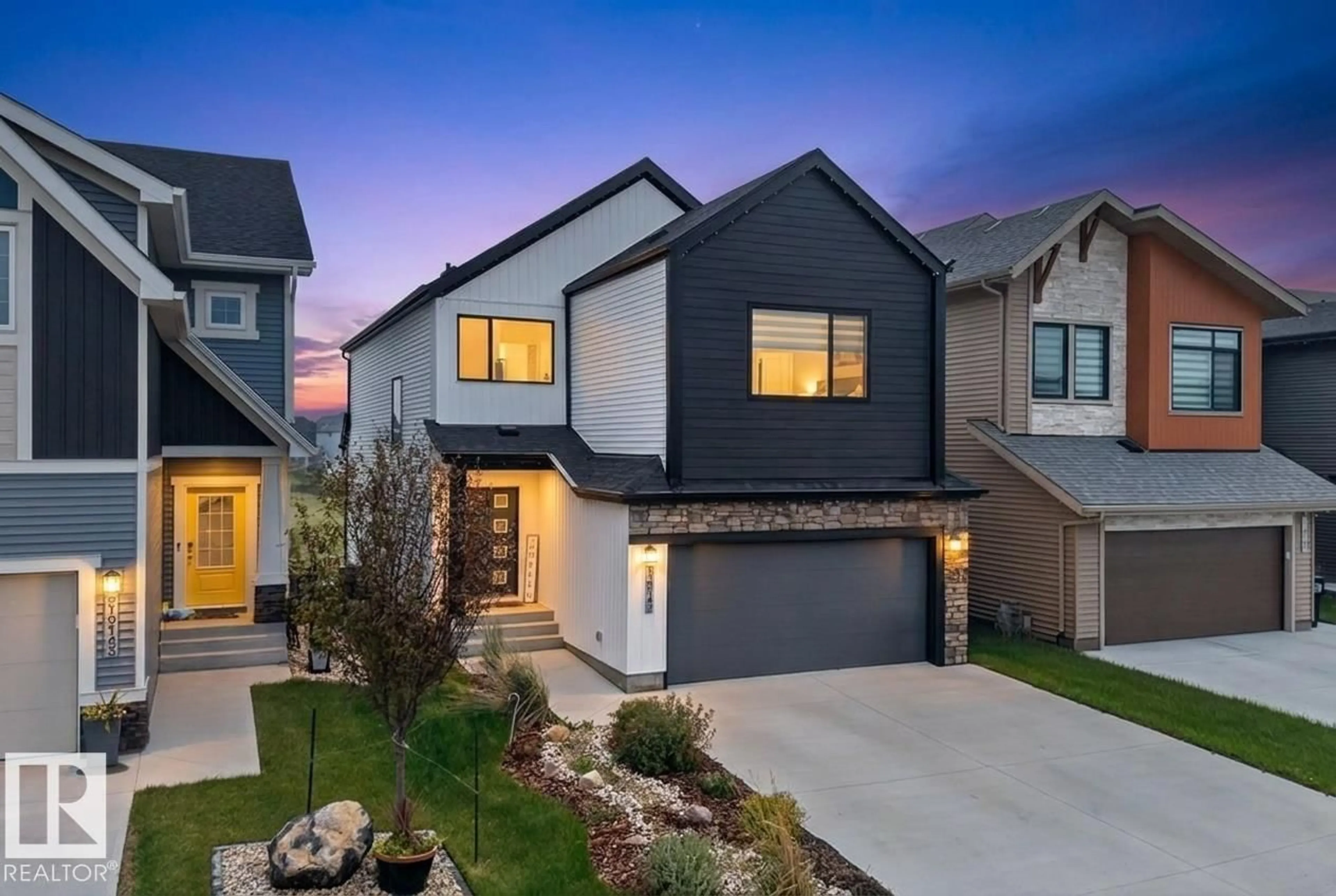 Home with brick exterior material, street for 19147 22 AV NW, Edmonton Alberta T6M1R1