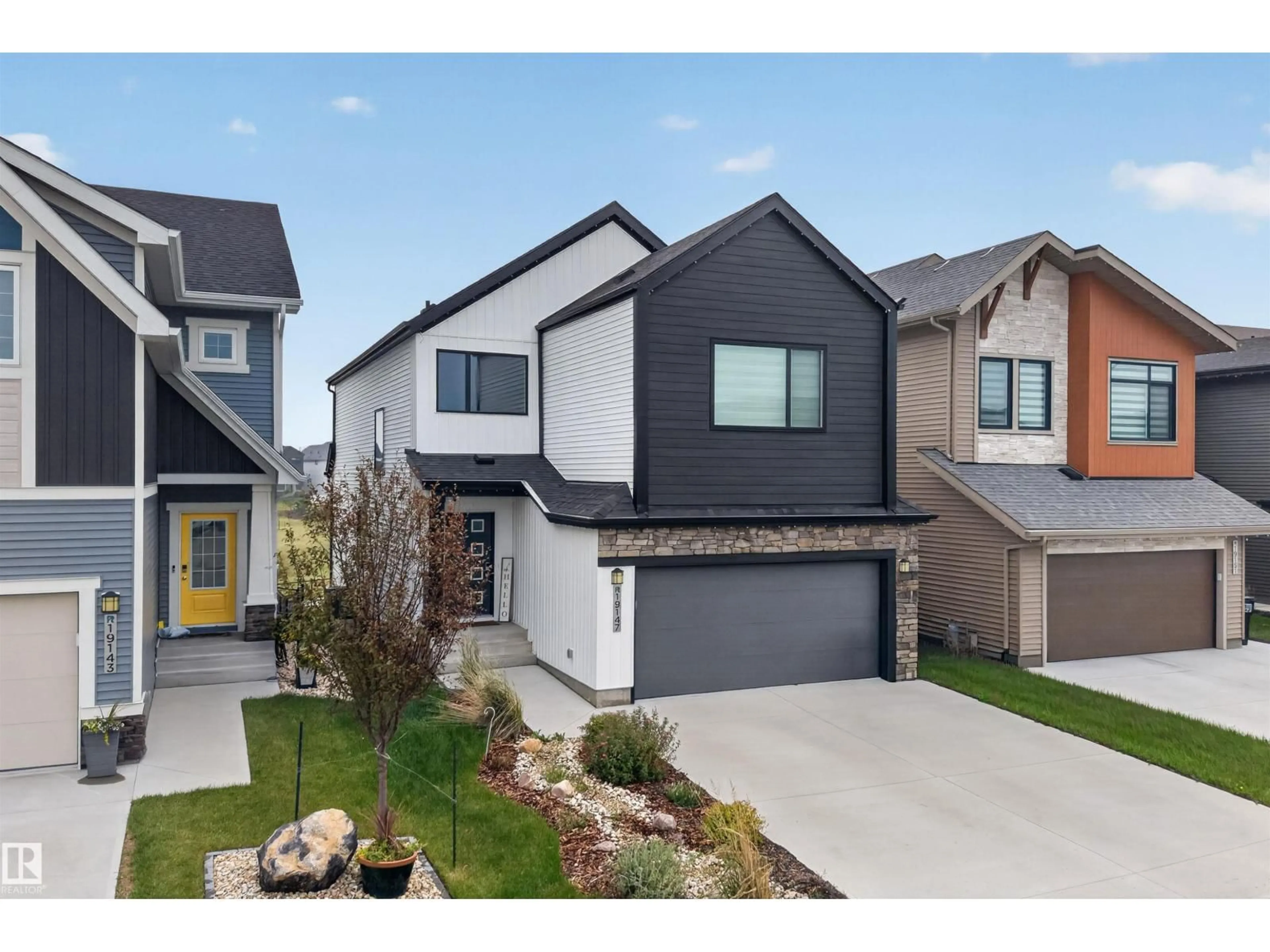 Home with brick exterior material, street for 19147 22 AV NW, Edmonton Alberta T6M1R1