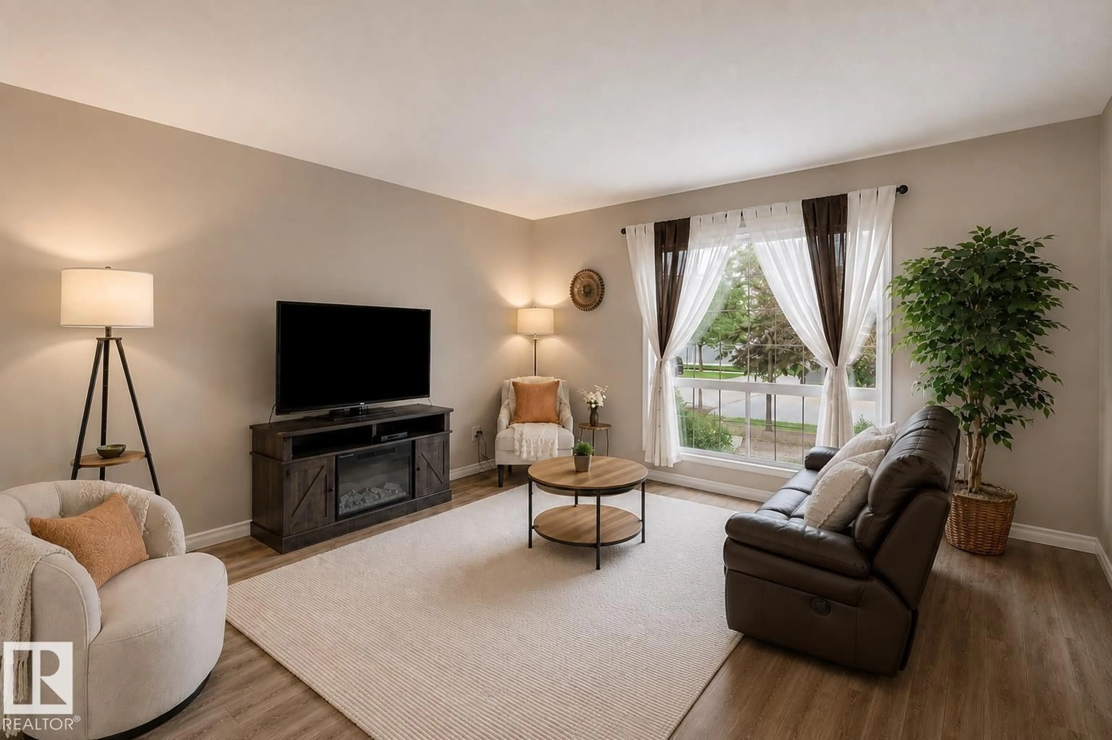 Living room with furniture, unknown for NW - 16114 43 ST, Edmonton Alberta T5Y0G5