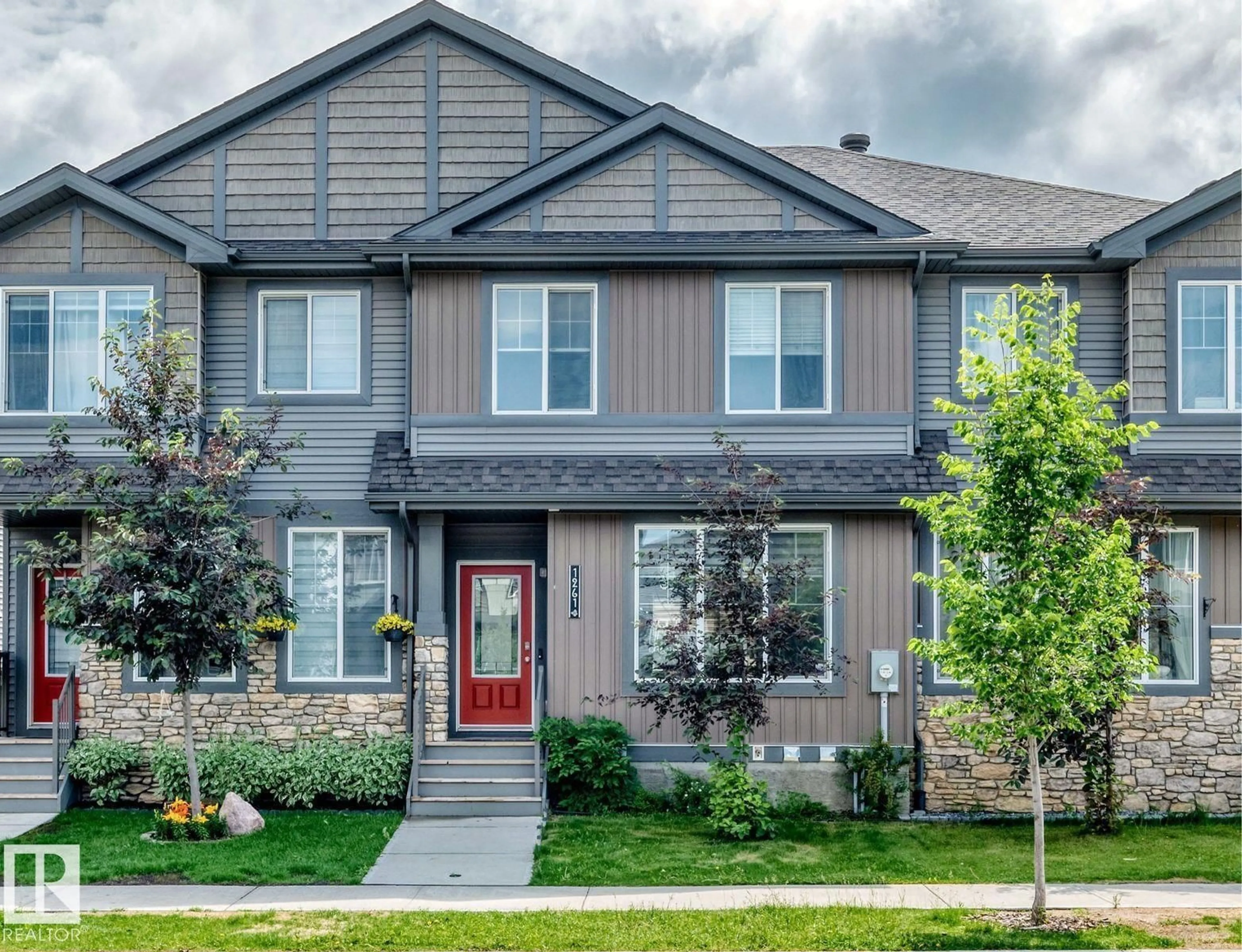 Home with vinyl exterior material, street for 1261 ROSENTHAL BV, Edmonton Alberta T5T7N6