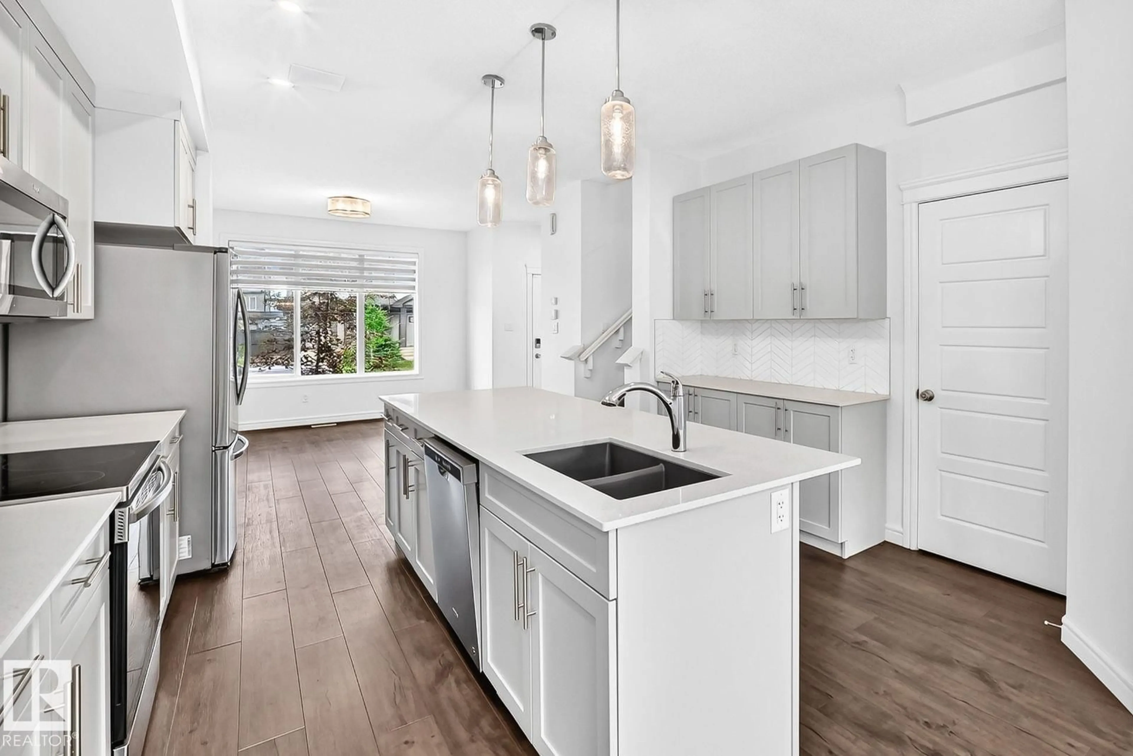 Open concept kitchen, ceramic/tile floor for 1261 ROSENTHAL BV, Edmonton Alberta T5T7N6