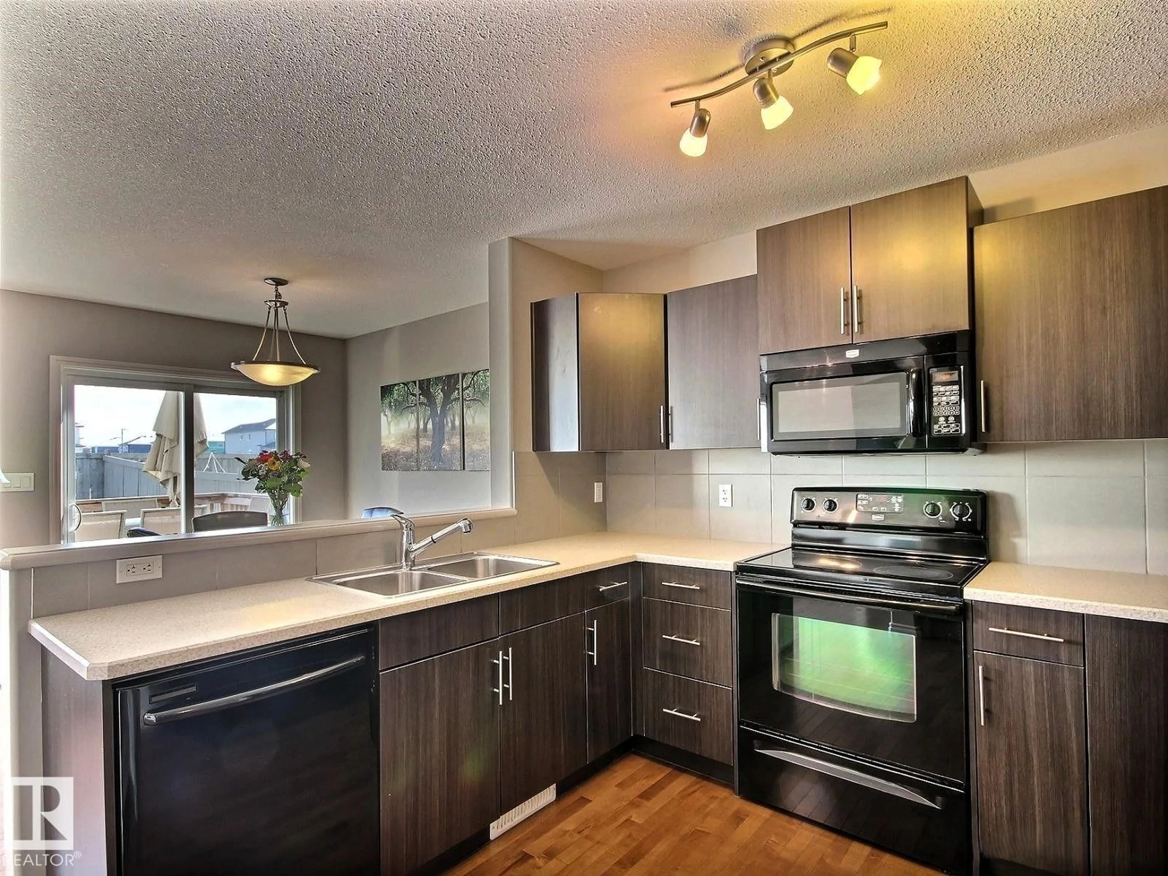 Open concept kitchen, unknown for NW - 2153 28 ST, Edmonton Alberta T6T0K1