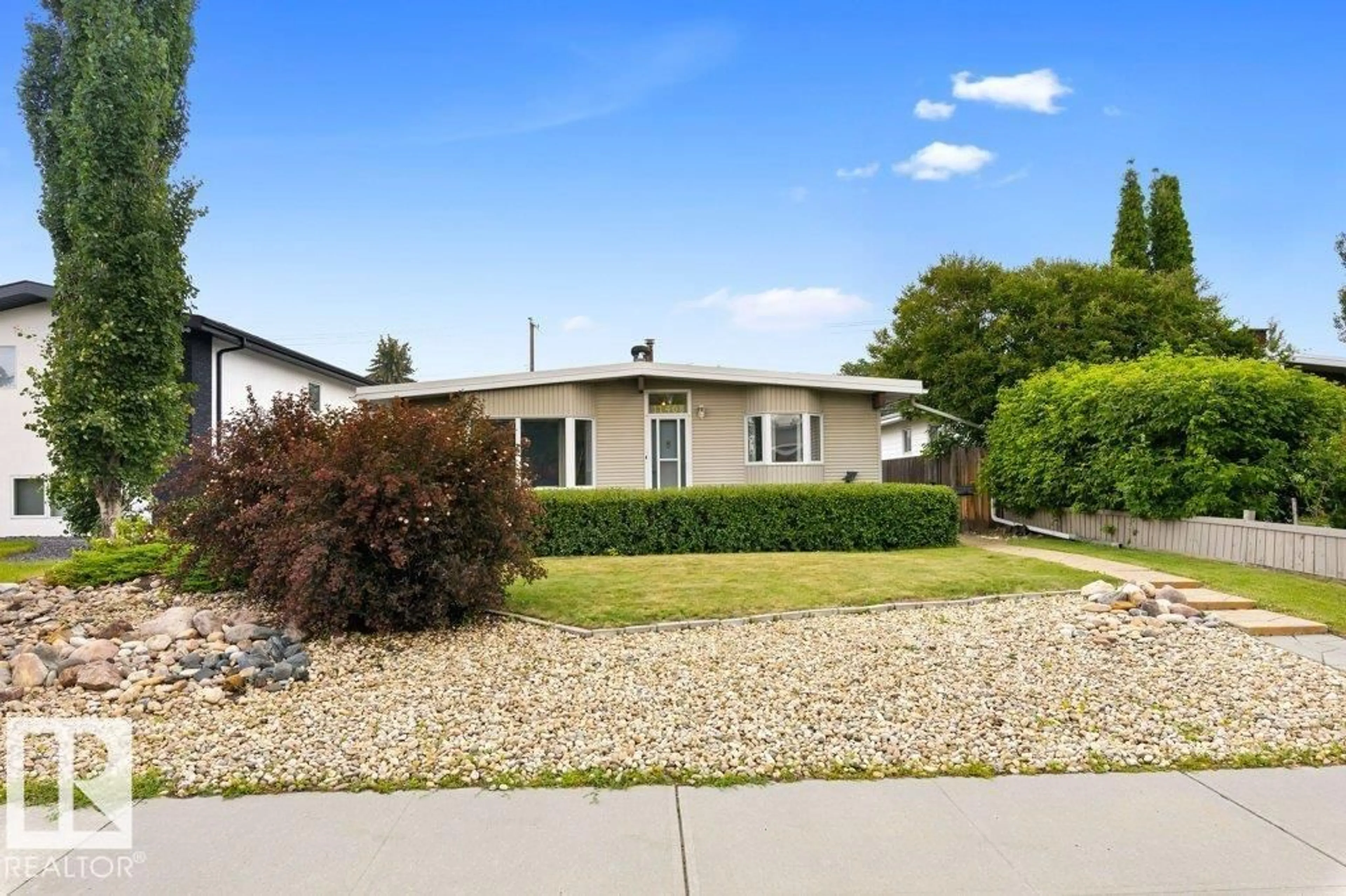 Home with vinyl exterior material, street for 11408 53 AV, Edmonton Alberta T6H0S8