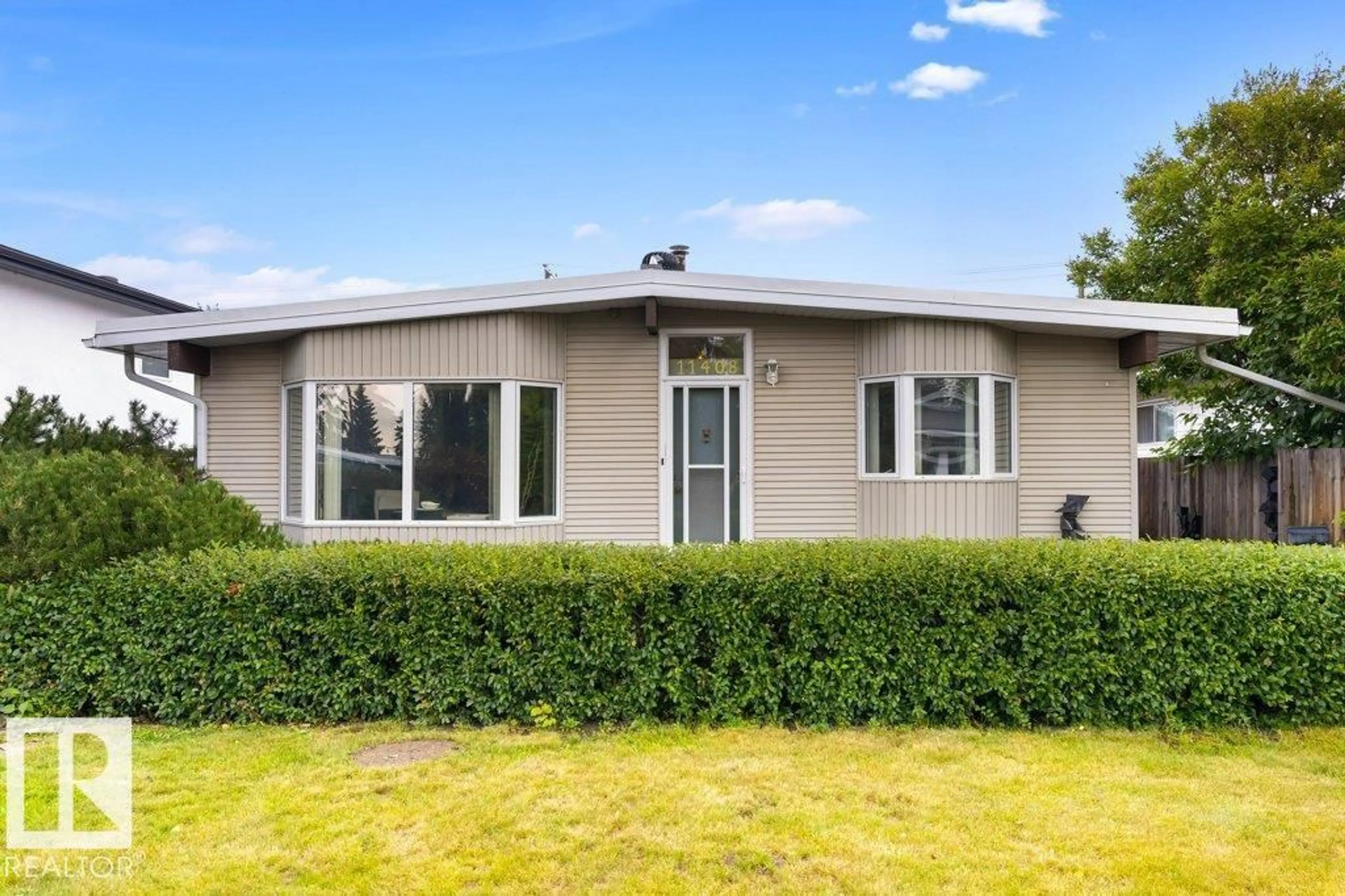 Home with vinyl exterior material, building for 11408 53 AV, Edmonton Alberta T6H0S8