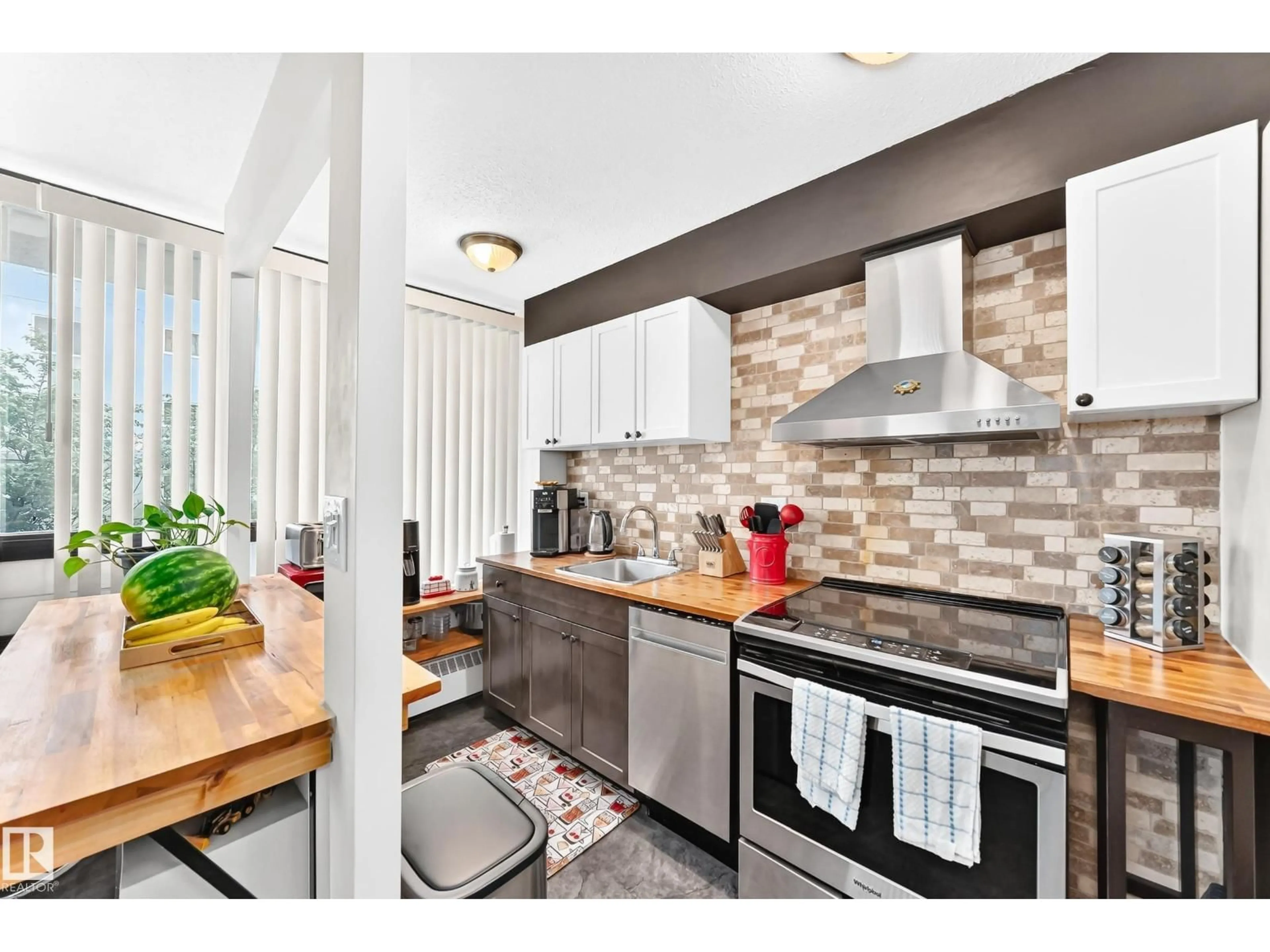 Open concept kitchen, ceramic/tile floor for #230 - 10160 114 ST, Edmonton Alberta T5K2L2