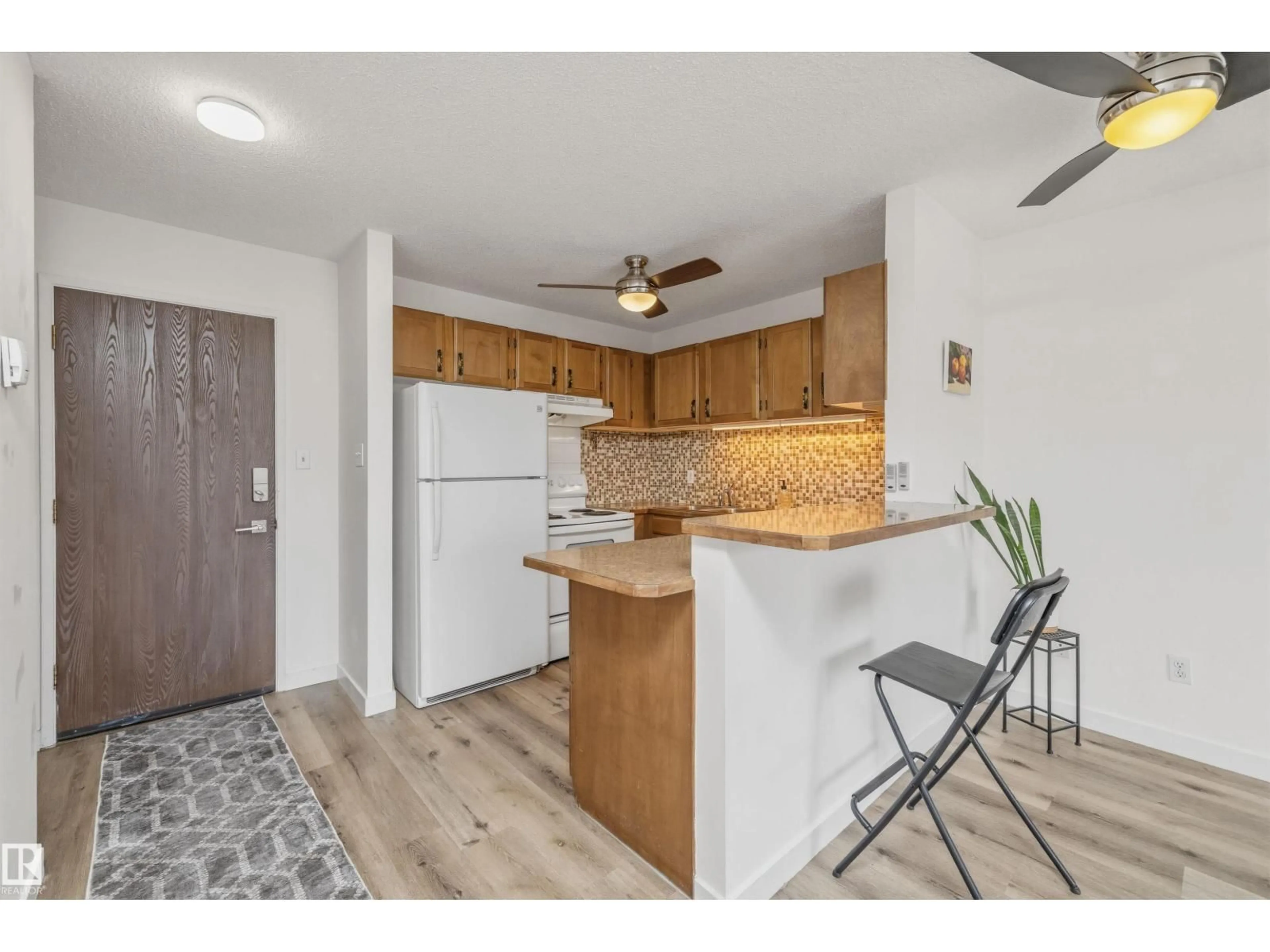 Standard kitchen, wood/laminate floor for #8 - 10931 83 ST, Edmonton Alberta T5H1M2