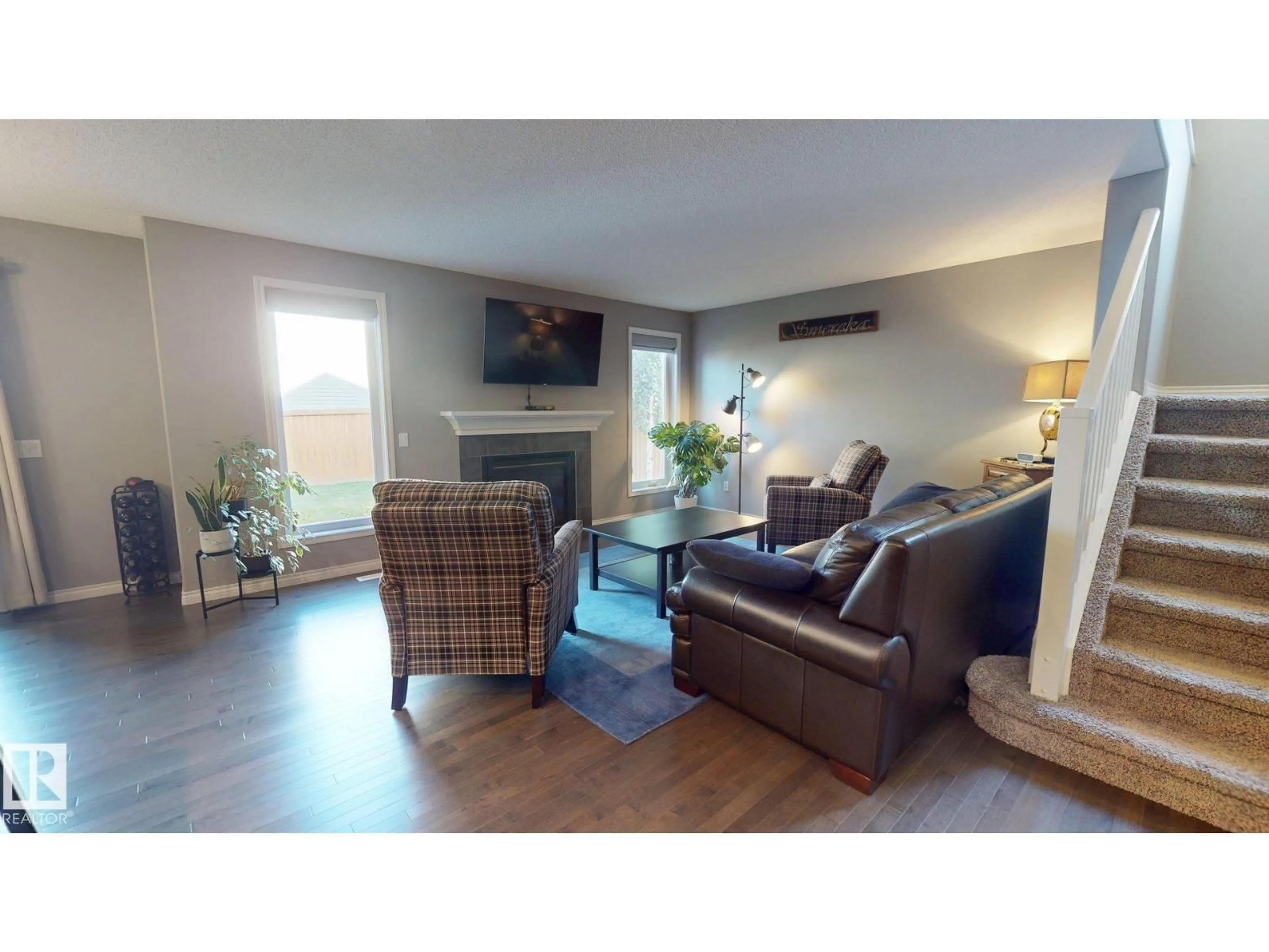 Living room with furniture, wood/laminate floor for 537 FAIRWAY CO, Stony Plain Alberta T7Z0G9