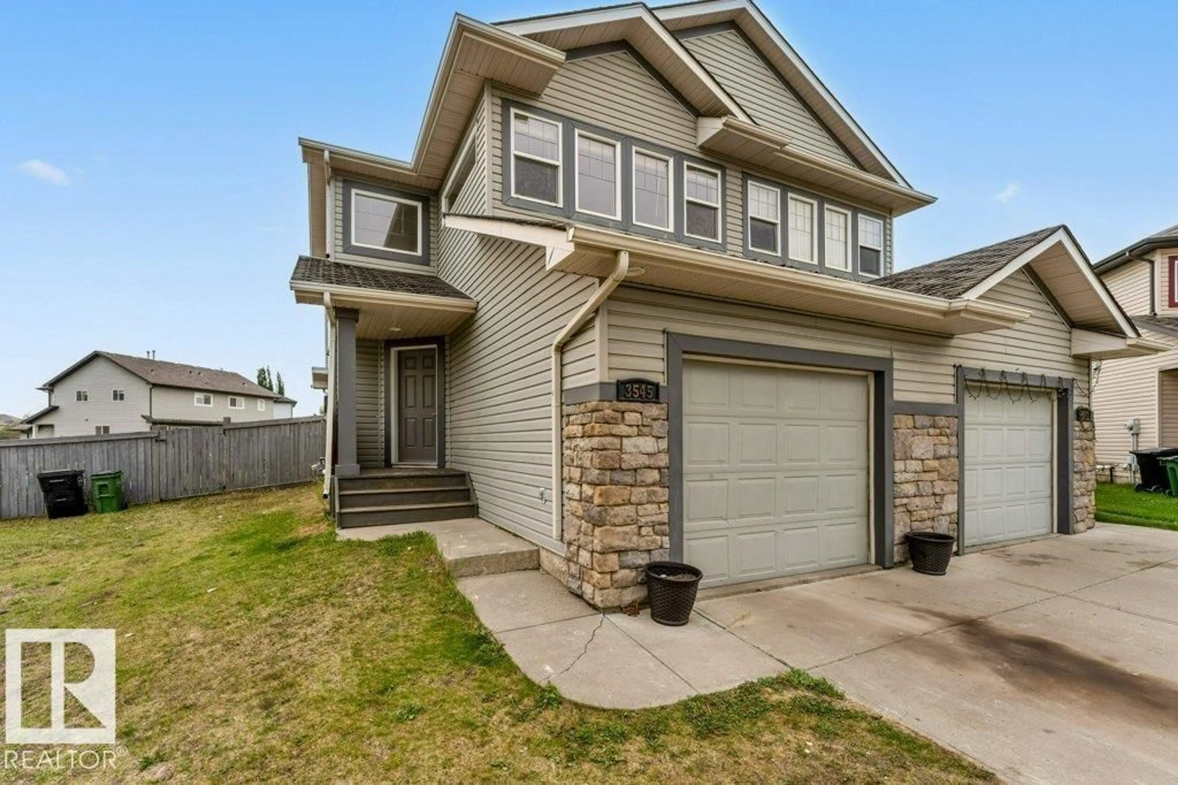 Home with vinyl exterior material, street for 3545 11 ST, Edmonton Alberta T6T0J7