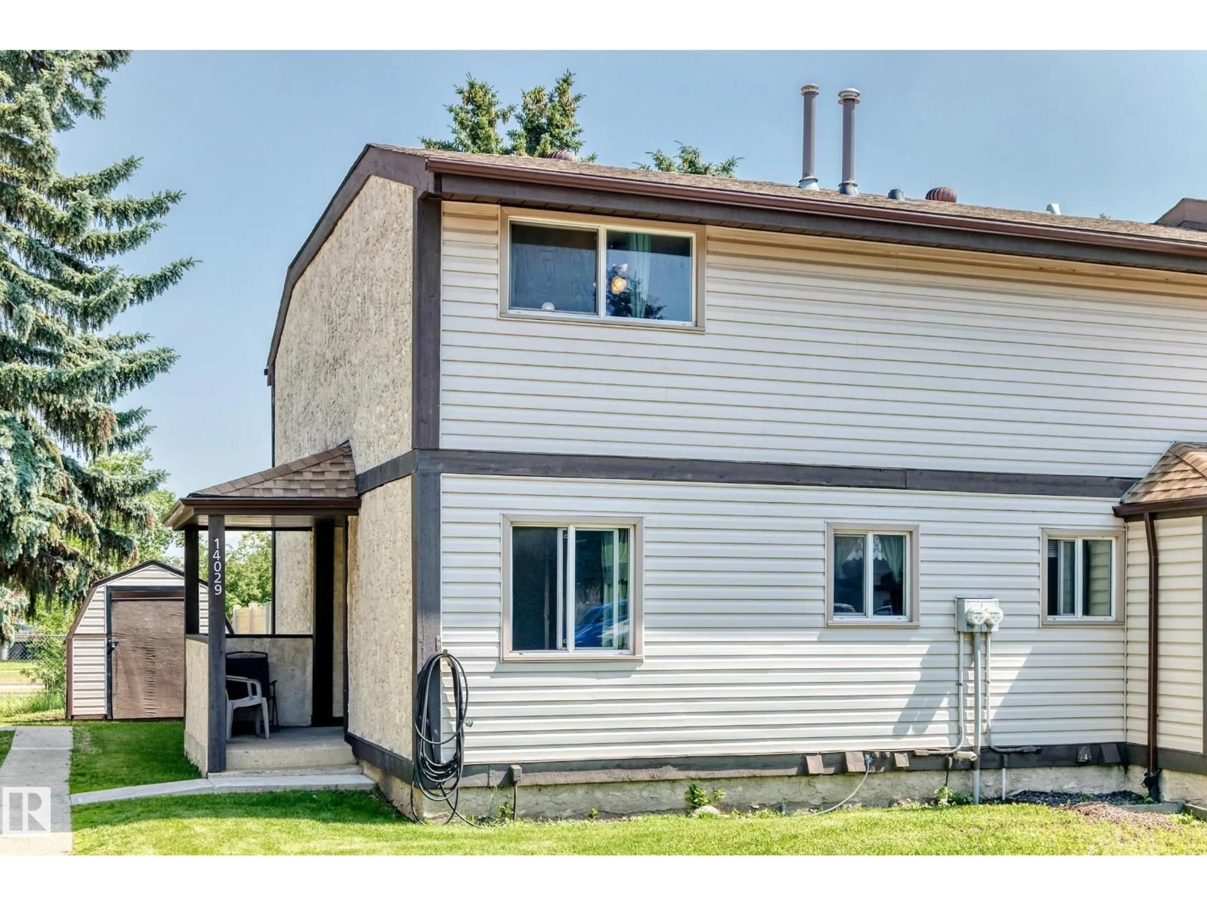 Home with vinyl exterior material, street for NW - 14029 30 ST, Edmonton Alberta T5Y1R5