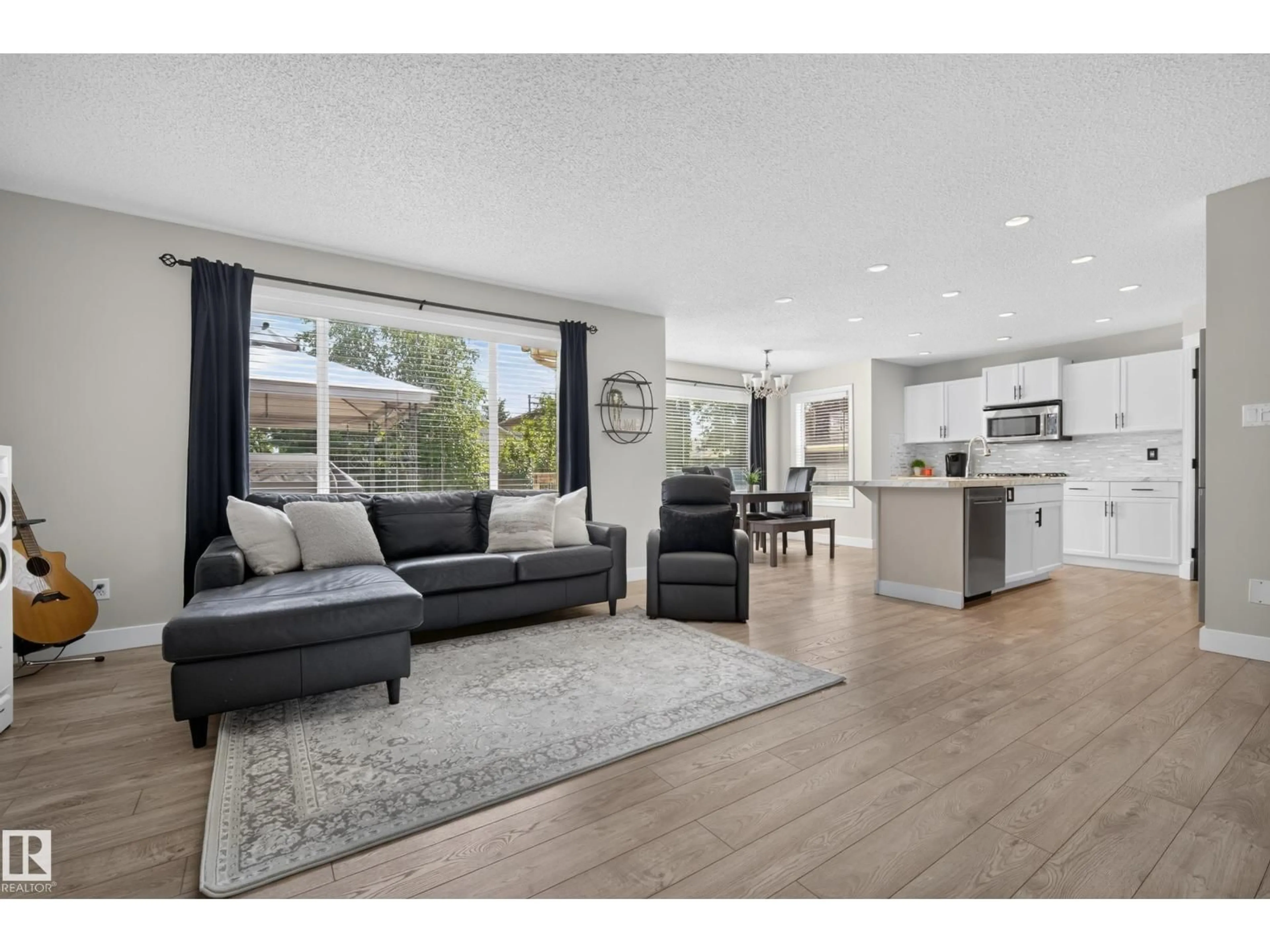 Open concept kitchen, wood/laminate floor for 164 FORREST DR, Sherwood Park Alberta T8A6A8