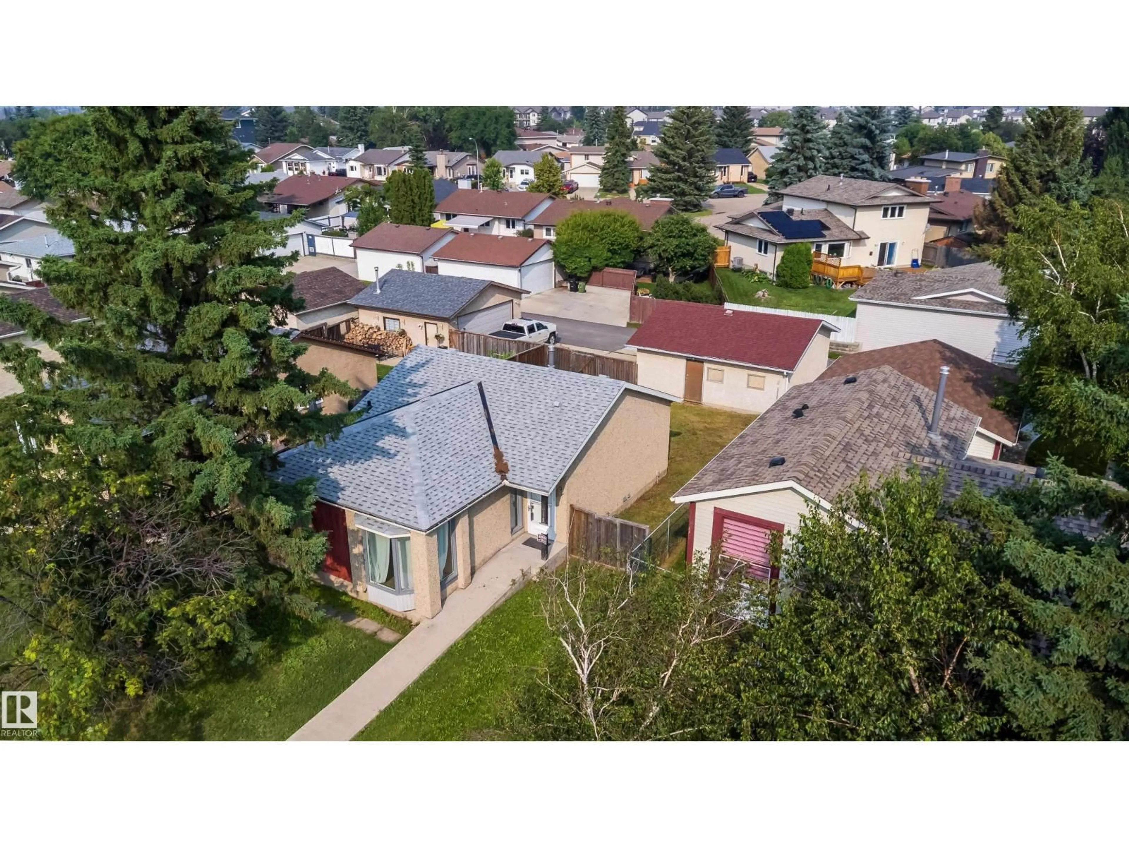 A pic from outside/outdoor area/front of a property/back of a property/a pic from drone, street for 1719 37 ST, Edmonton Alberta T6L2P6