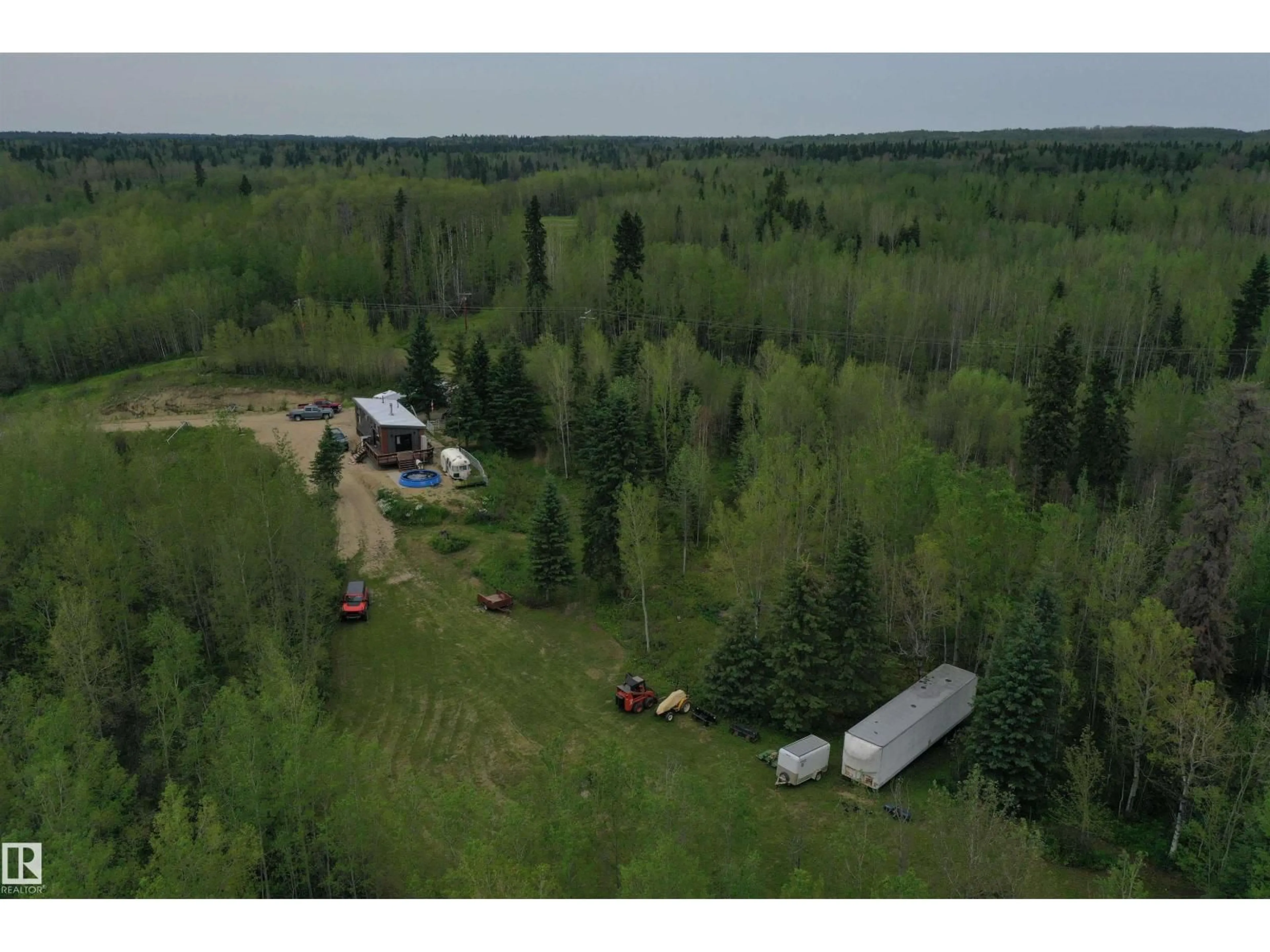 A pic from outside/outdoor area/front of a property/back of a property/a pic from drone, forest/trees view for 22080 TWP ROAD 463 A, Rural Wetaskiwin County Alberta T0C2V0