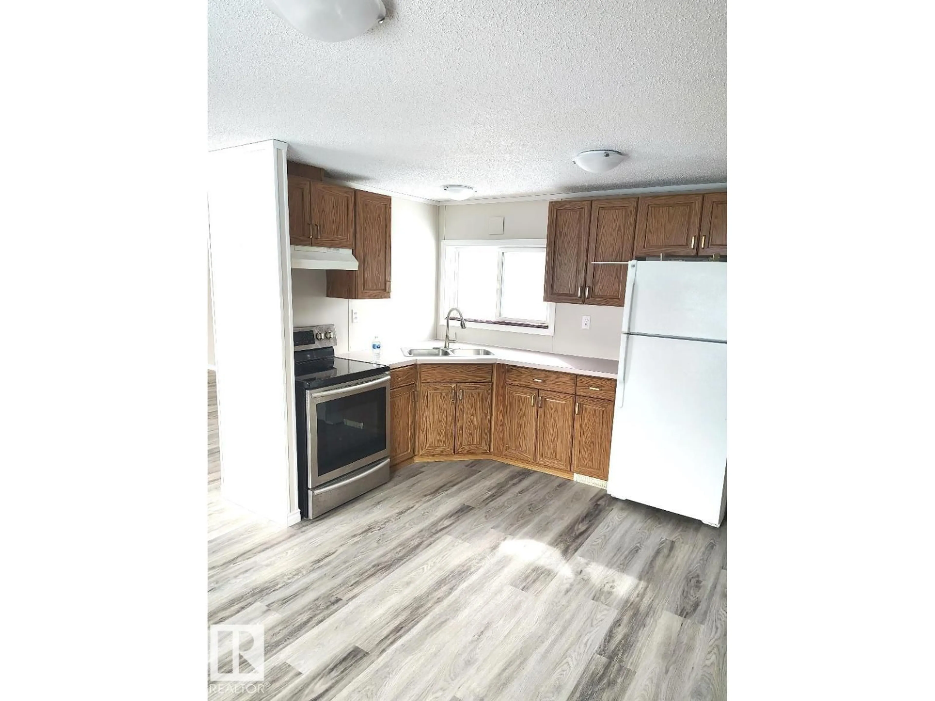 Standard kitchen, wood/laminate floor for 45 - 4819 51 AVENUE, Millet Alberta T0C1Z0