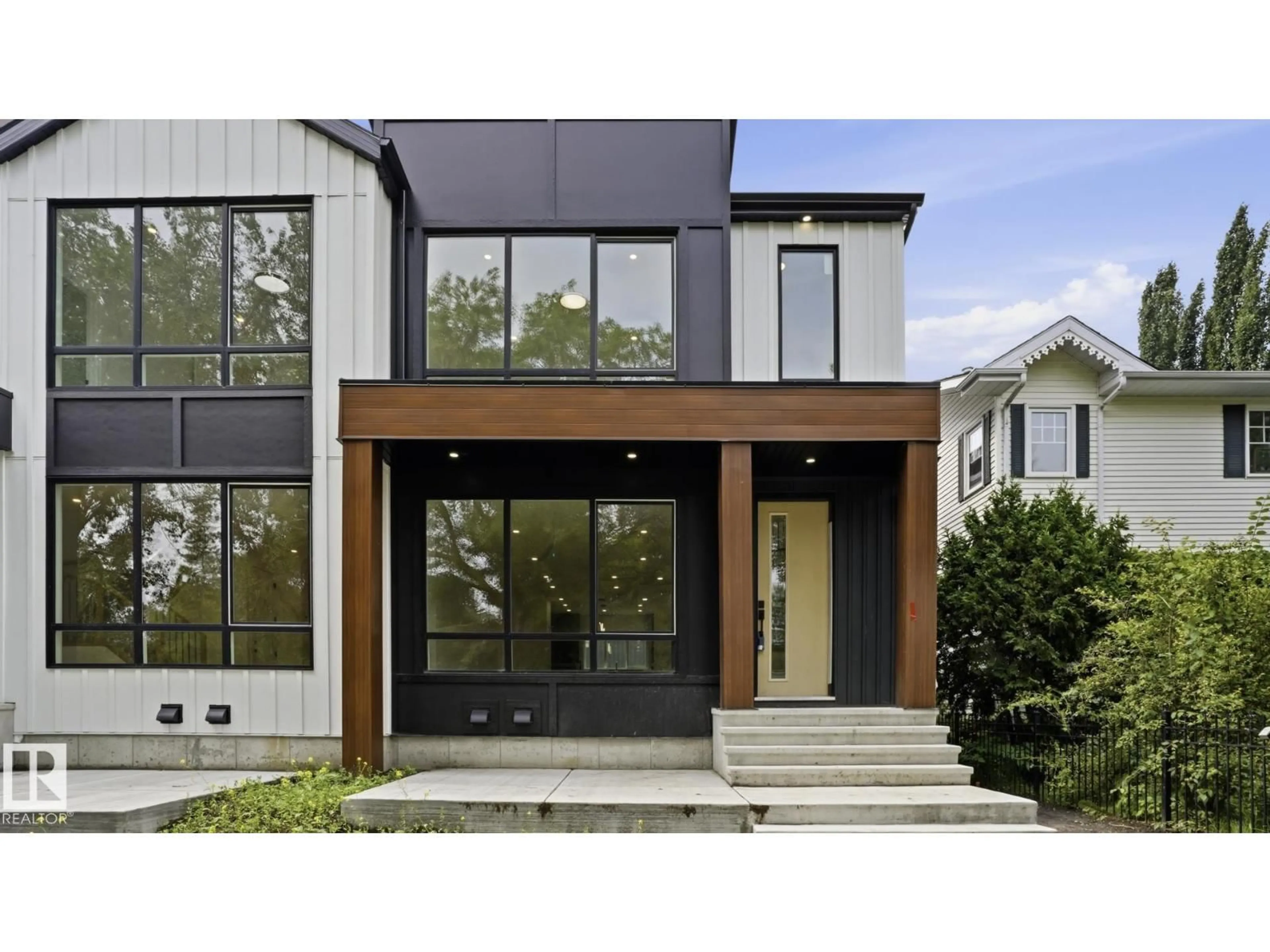 Home with brick exterior material, street for 9226 94 ST, Edmonton Alberta T6C3V5