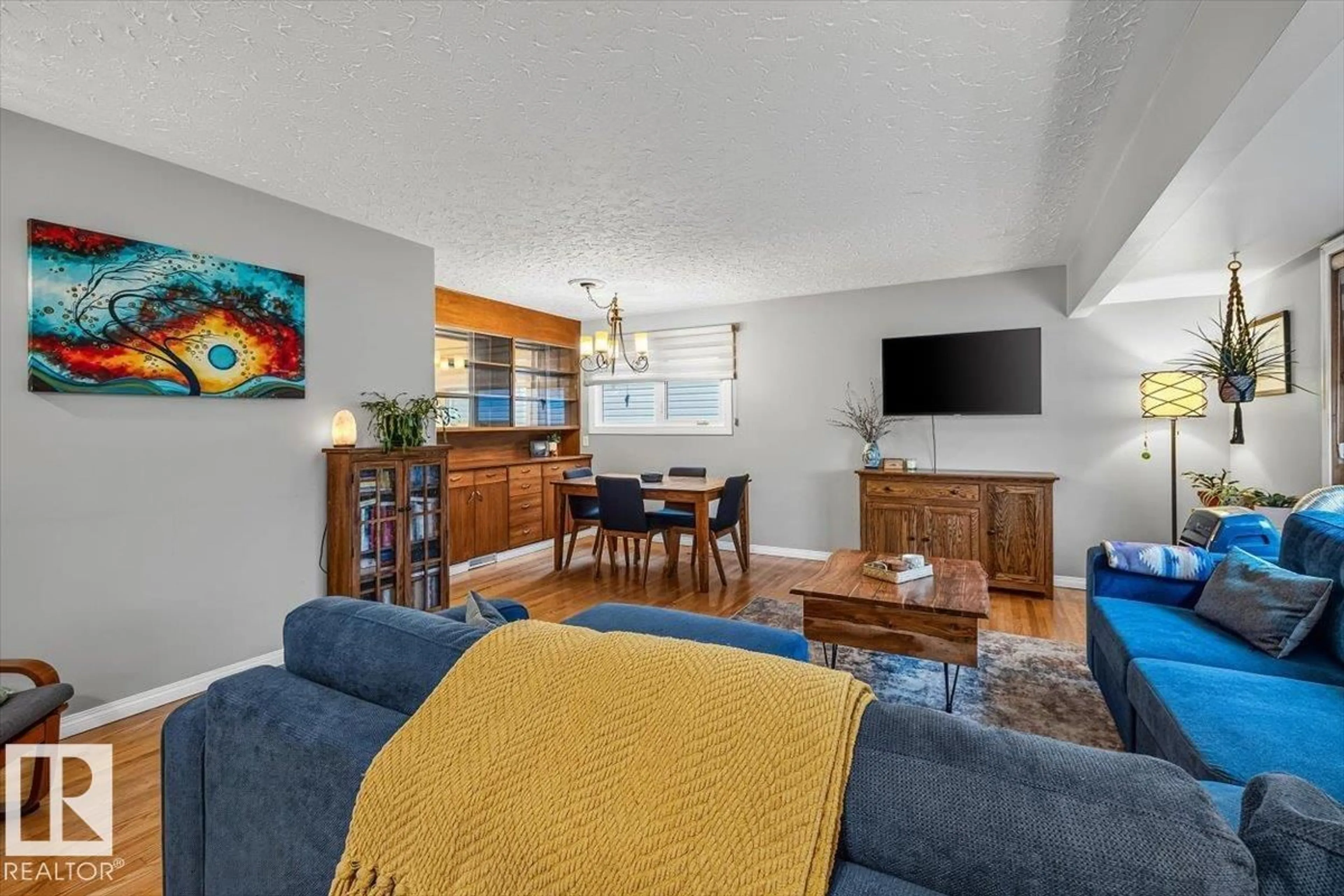Living room with furniture, unknown for 5903 102 AV NW, Edmonton Alberta T6A0N3