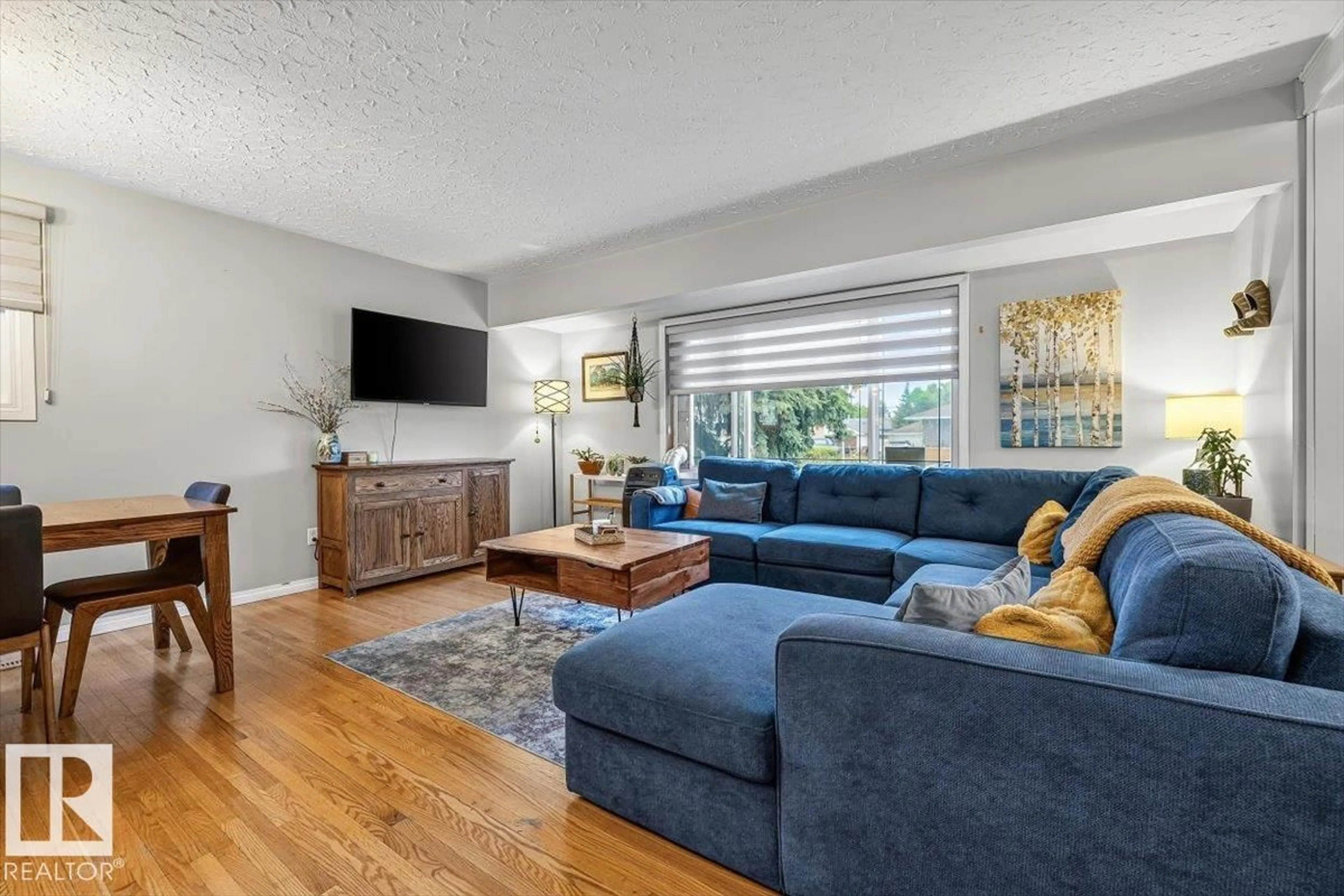 Living room with furniture, unknown for 5903 102 AV NW, Edmonton Alberta T6A0N3