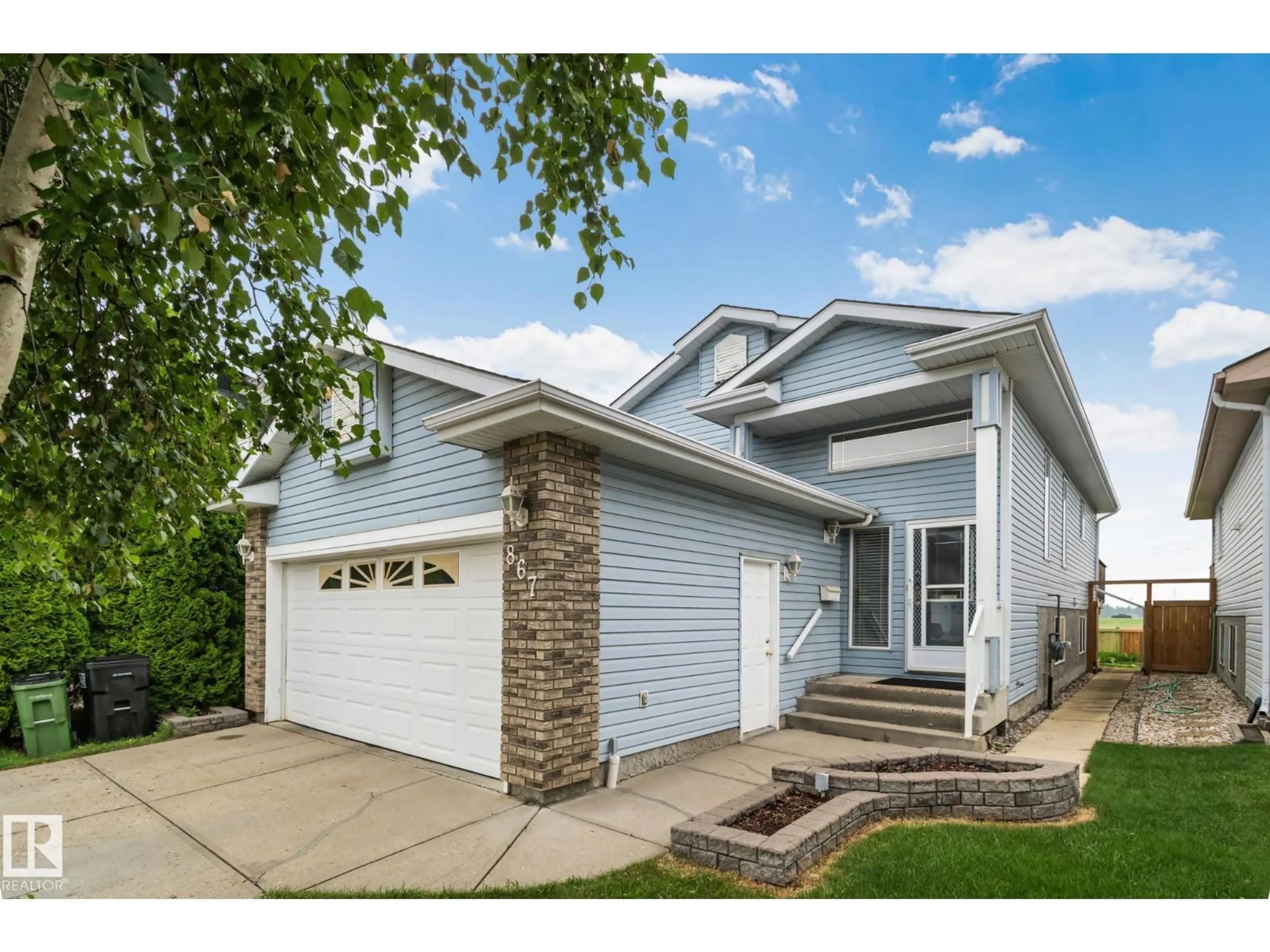 Home with vinyl exterior material, street for 867 BLACKLOCK WY, Edmonton Alberta T6W1C4