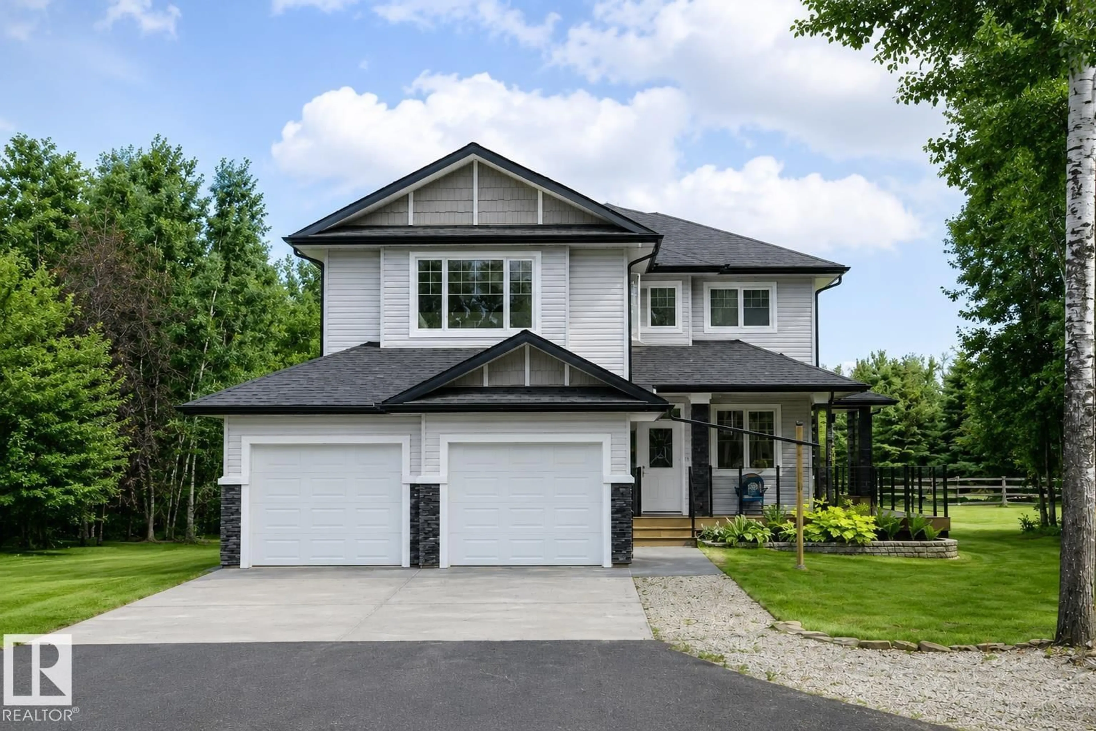 Home with vinyl exterior material, street for 90 47411 RGE RD 14, Rural Leduc County Alberta T0C2P0