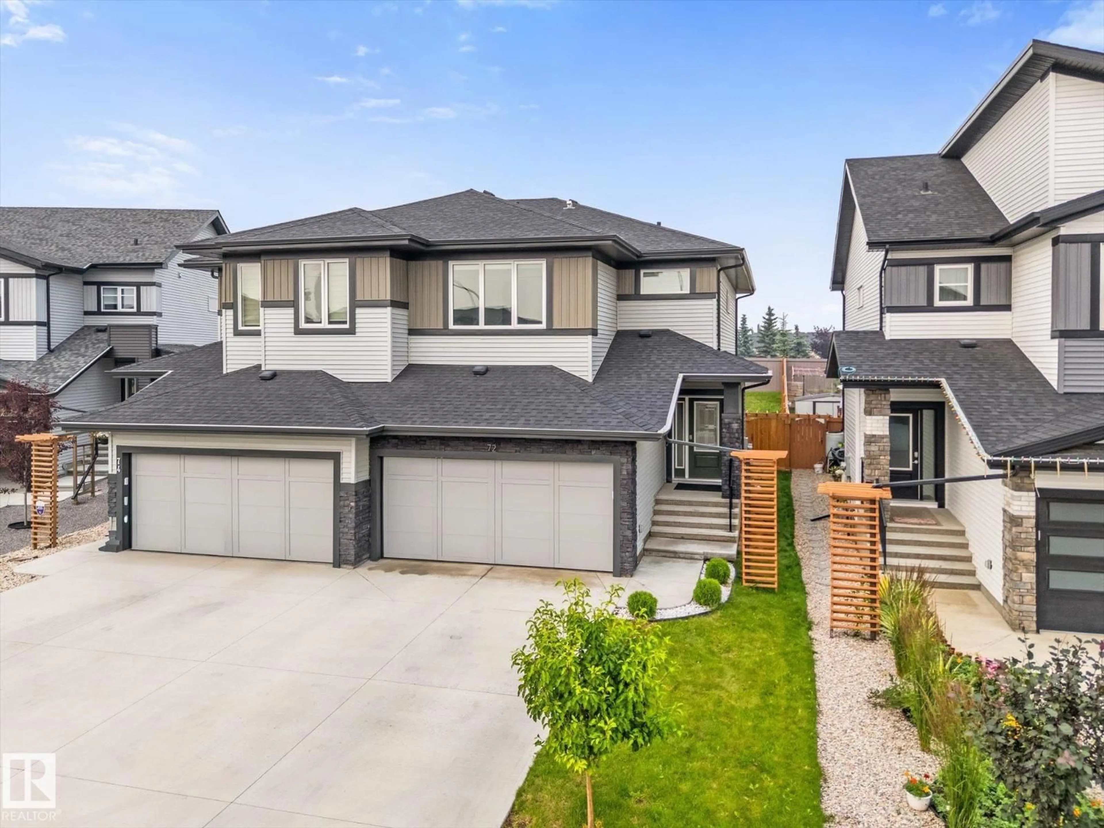 A pic from outside/outdoor area/front of a property/back of a property/a pic from drone, street for 72 SPRUCE GARDENS CR, Spruce Grove Alberta T7X0J9