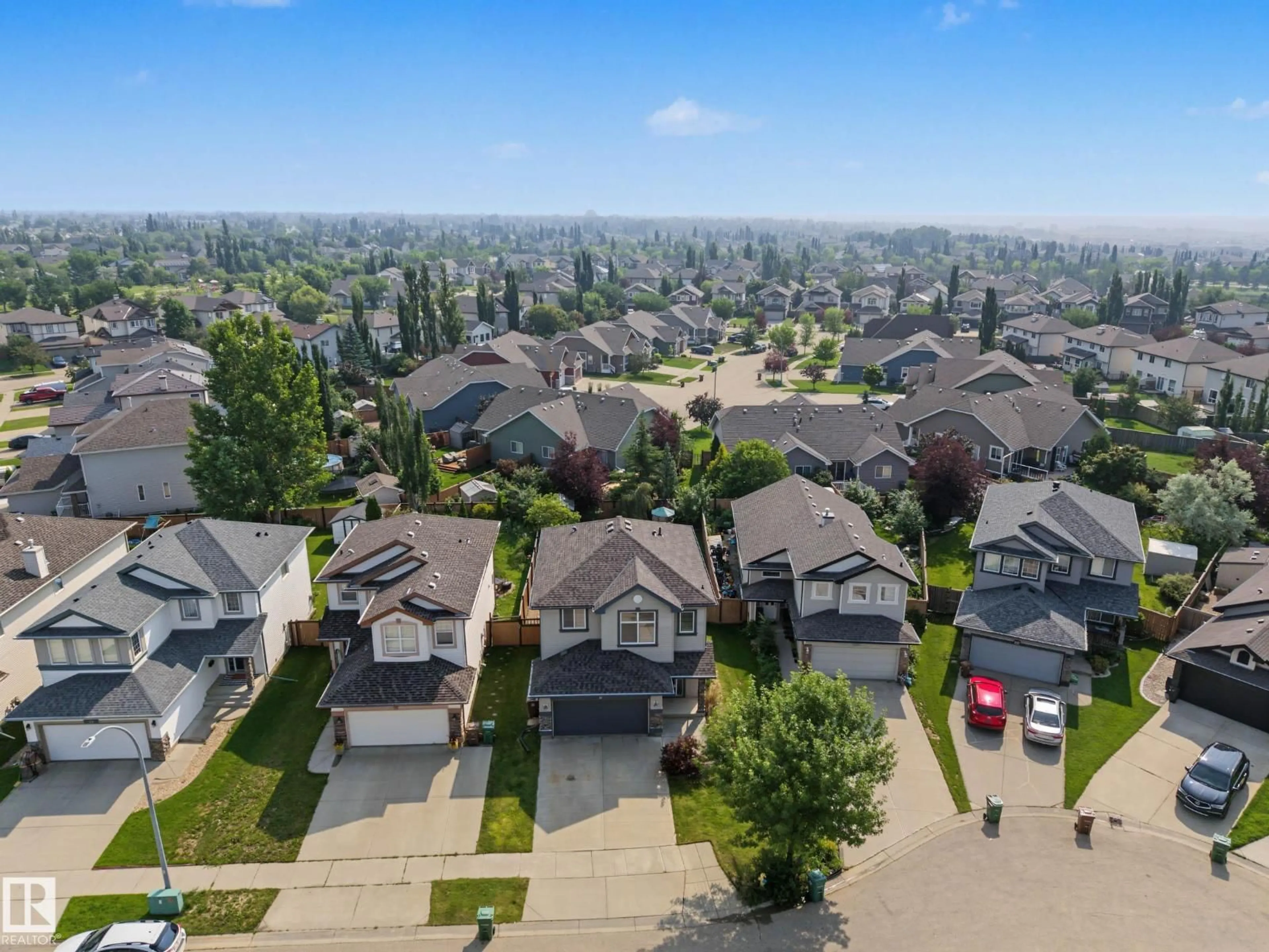 A pic from outside/outdoor area/front of a property/back of a property/a pic from drone, unknown for 21 NASH CL, St. Albert Alberta T8N7E9