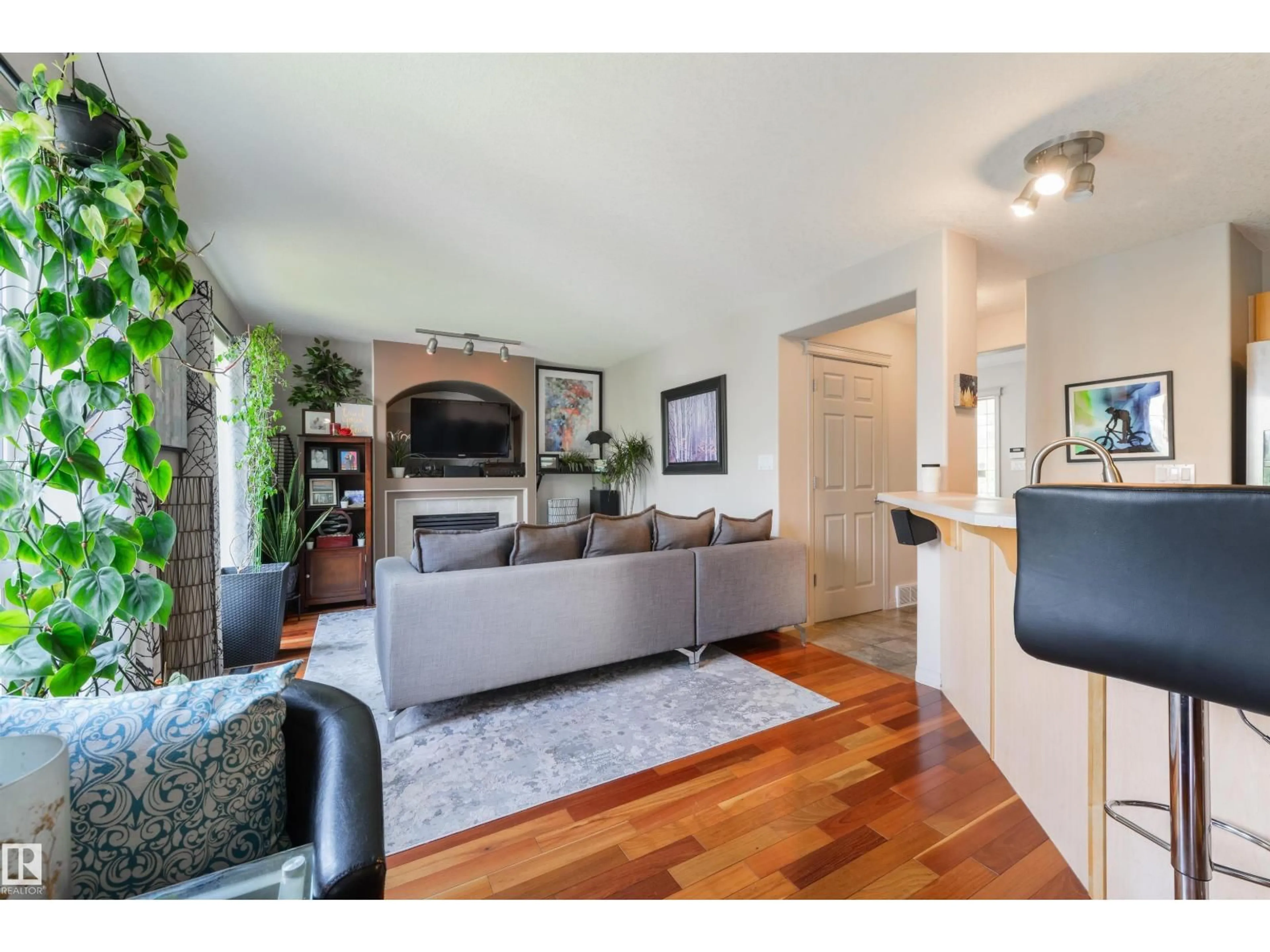 Living room with furniture, wood/laminate floor for NW - 1211 HENWOOD PL, Edmonton Alberta T6R2X4