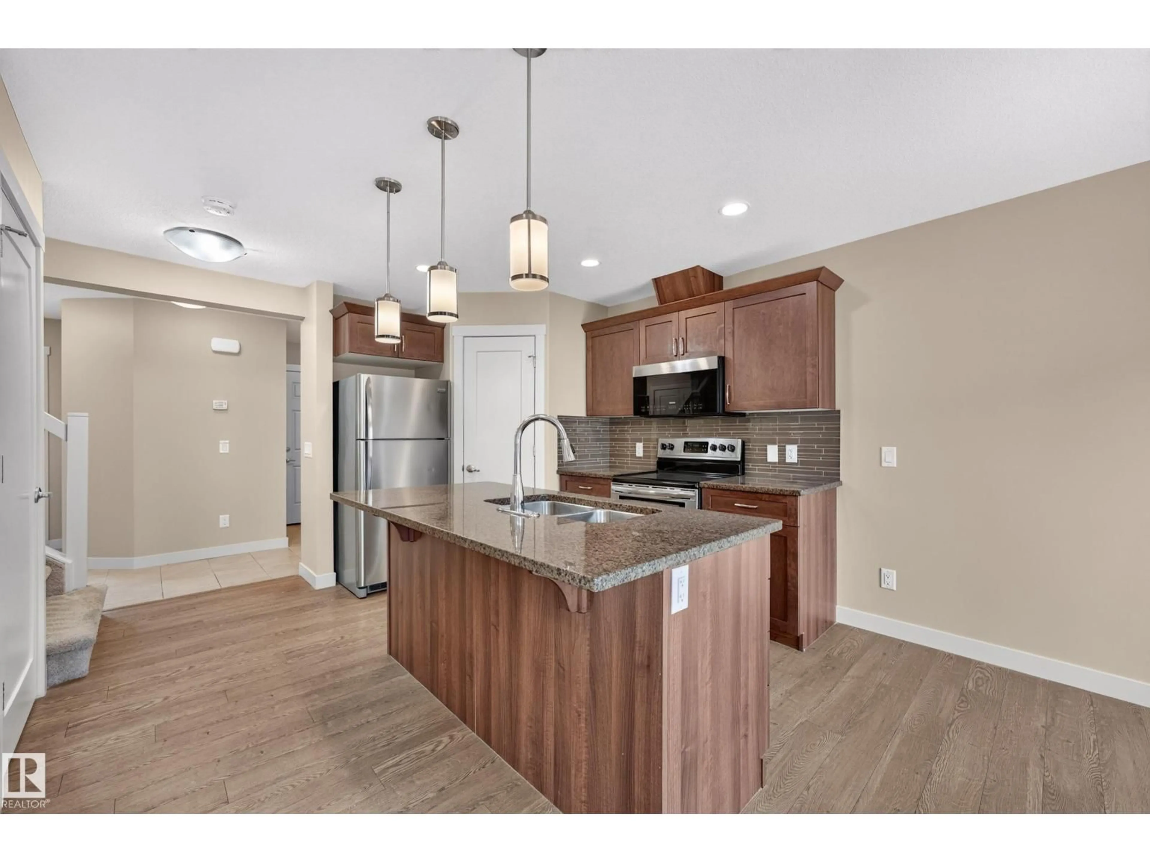 Open concept kitchen, unknown for 2730 SPARROW PL, Edmonton Alberta T5S0J6