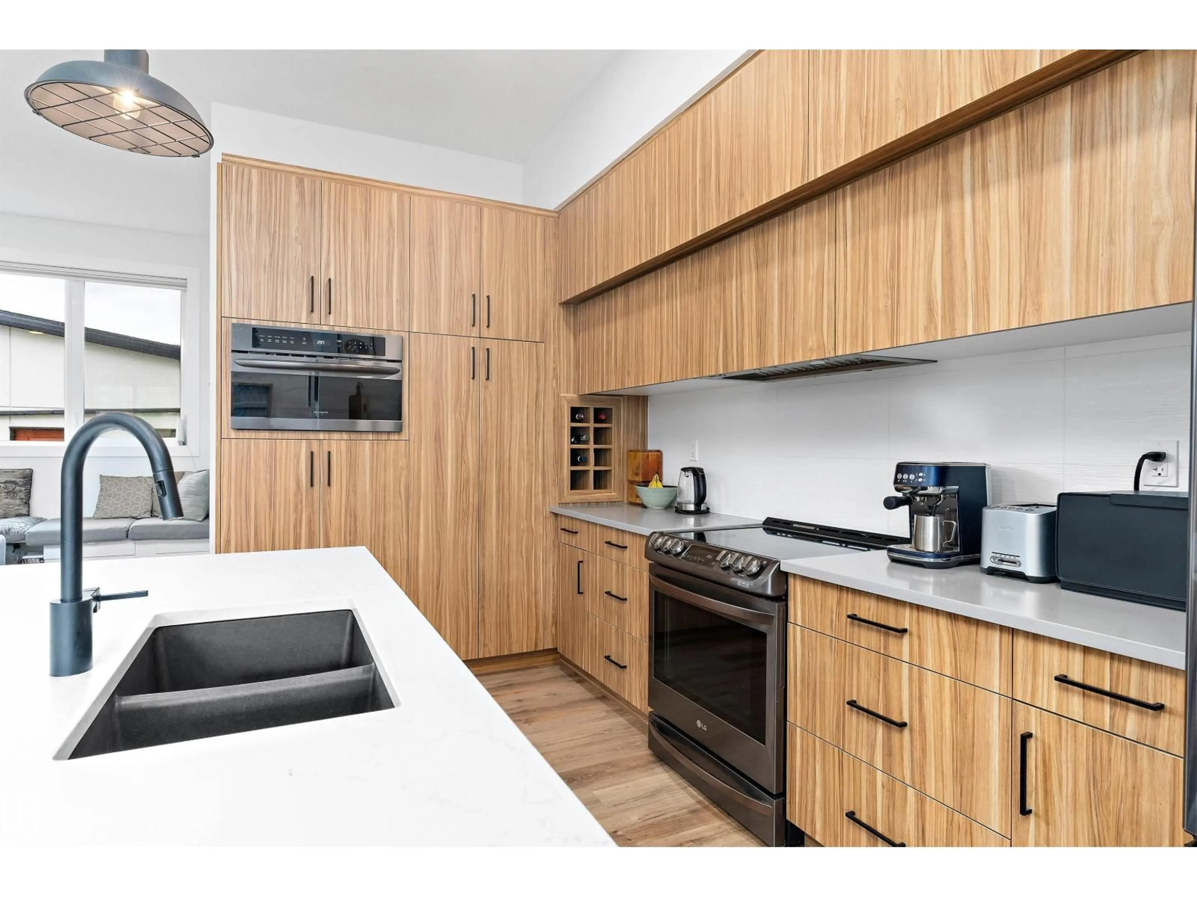 Standard kitchen, wood/laminate floor for 7747 YORKE ME, Edmonton Alberta T5G2R6